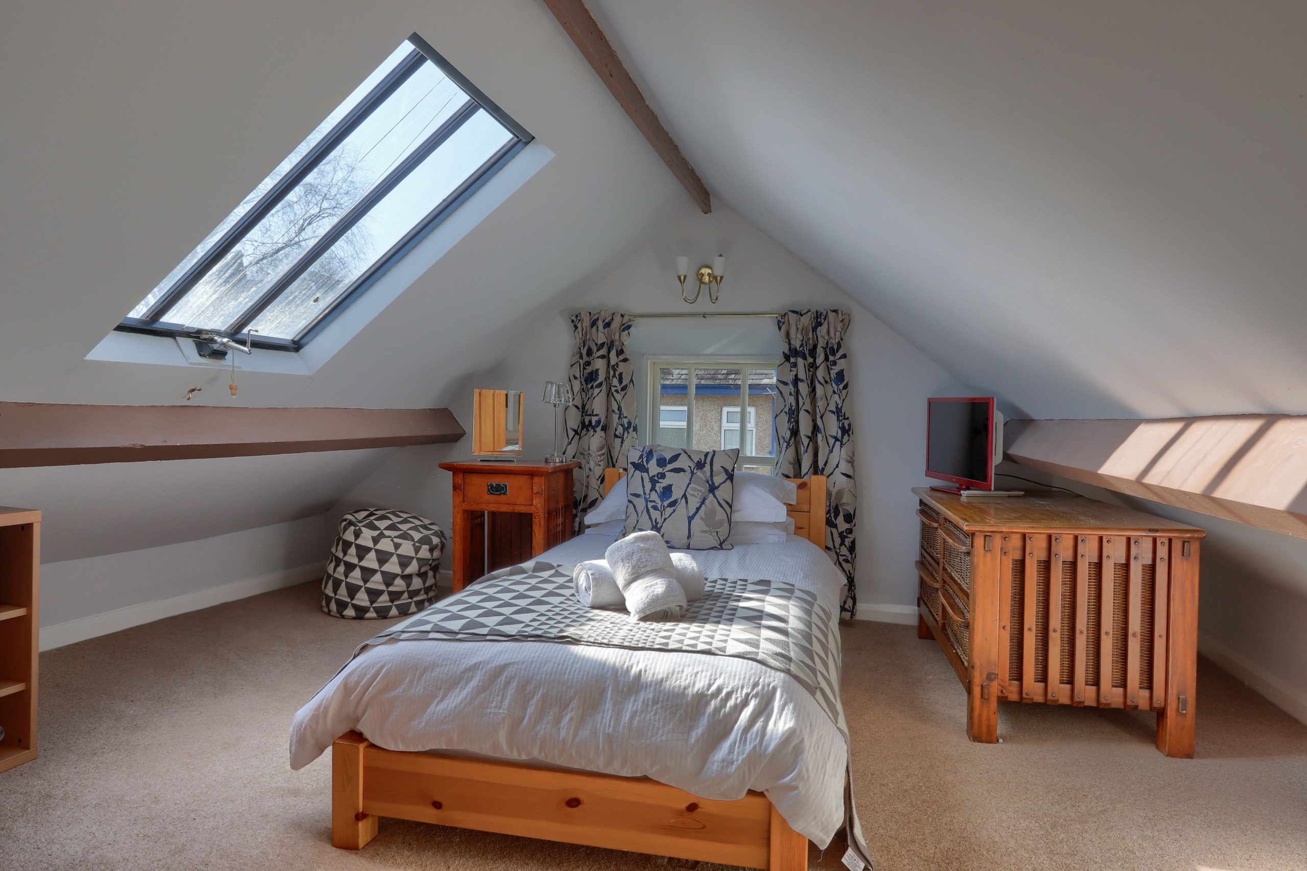 The single bedrooms can be found on the second floor of the property