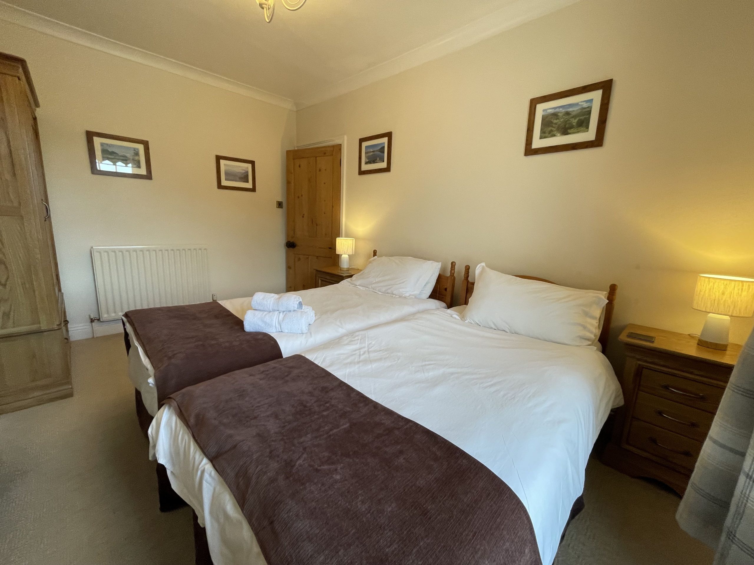 This bedroom also has a wardrobe, bedside tables and chest of drawers