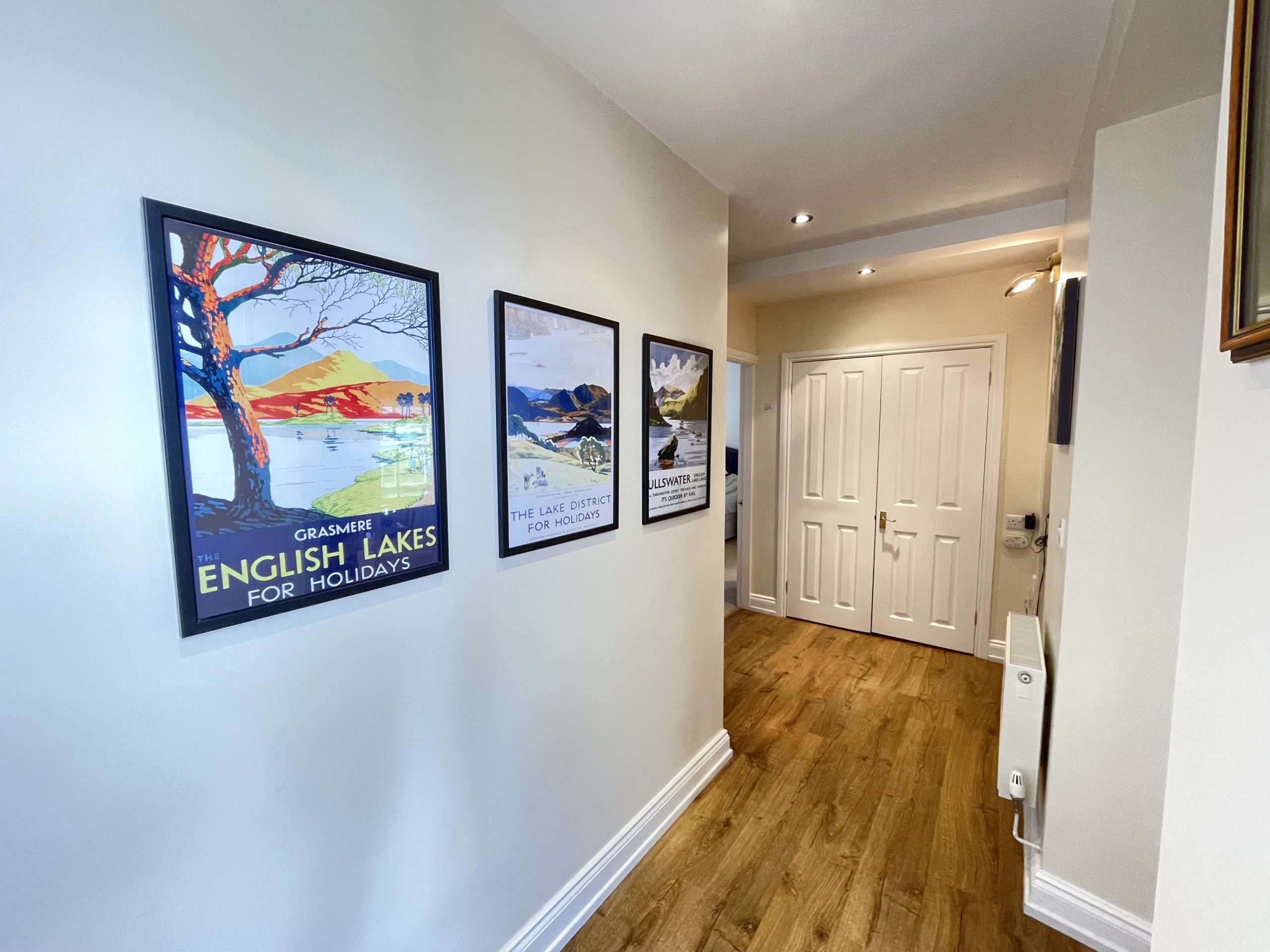 Throughout the hallway you can find vintage Lakeland poster prints 