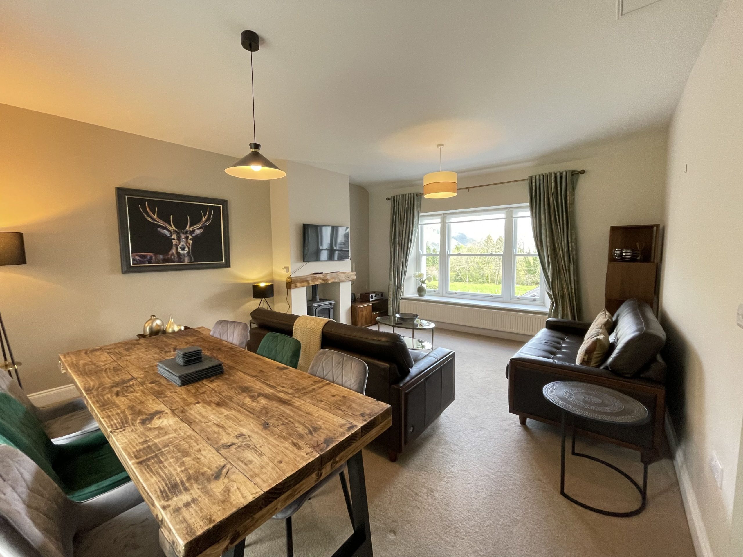 The living and dining area enjoy lovely views on both sides, towards Barf Fell and over to Dodd Fell and beyond