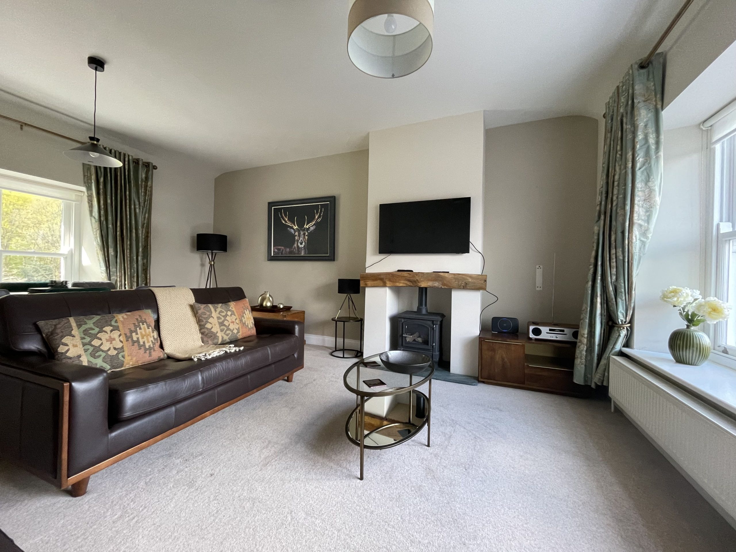The open plan living and dining area is beautifully decorated