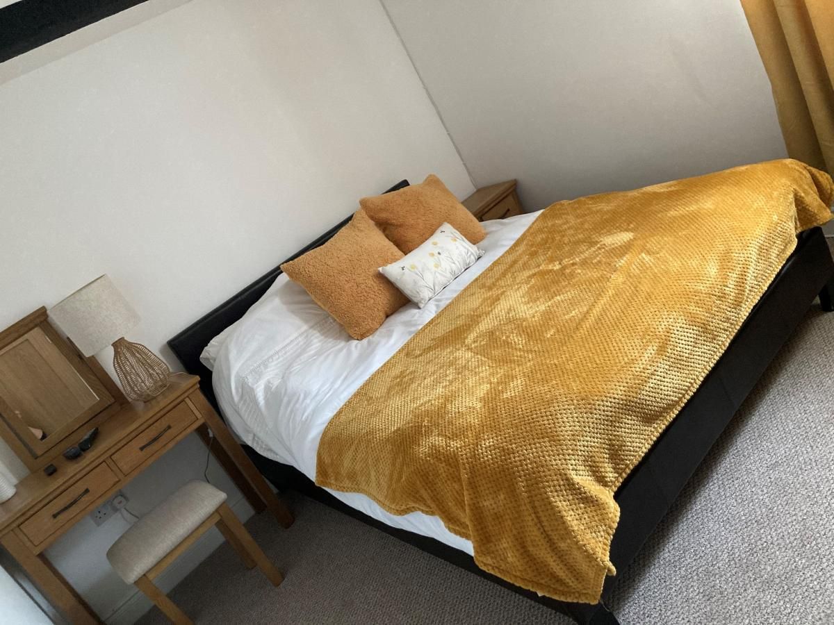 The master bedroom has a king sized bed