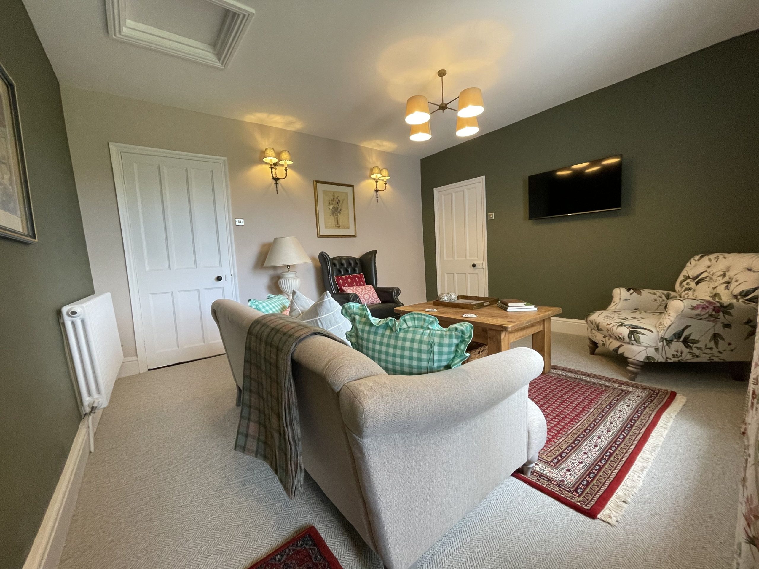 The living room can be found on the 1st floor of the property 