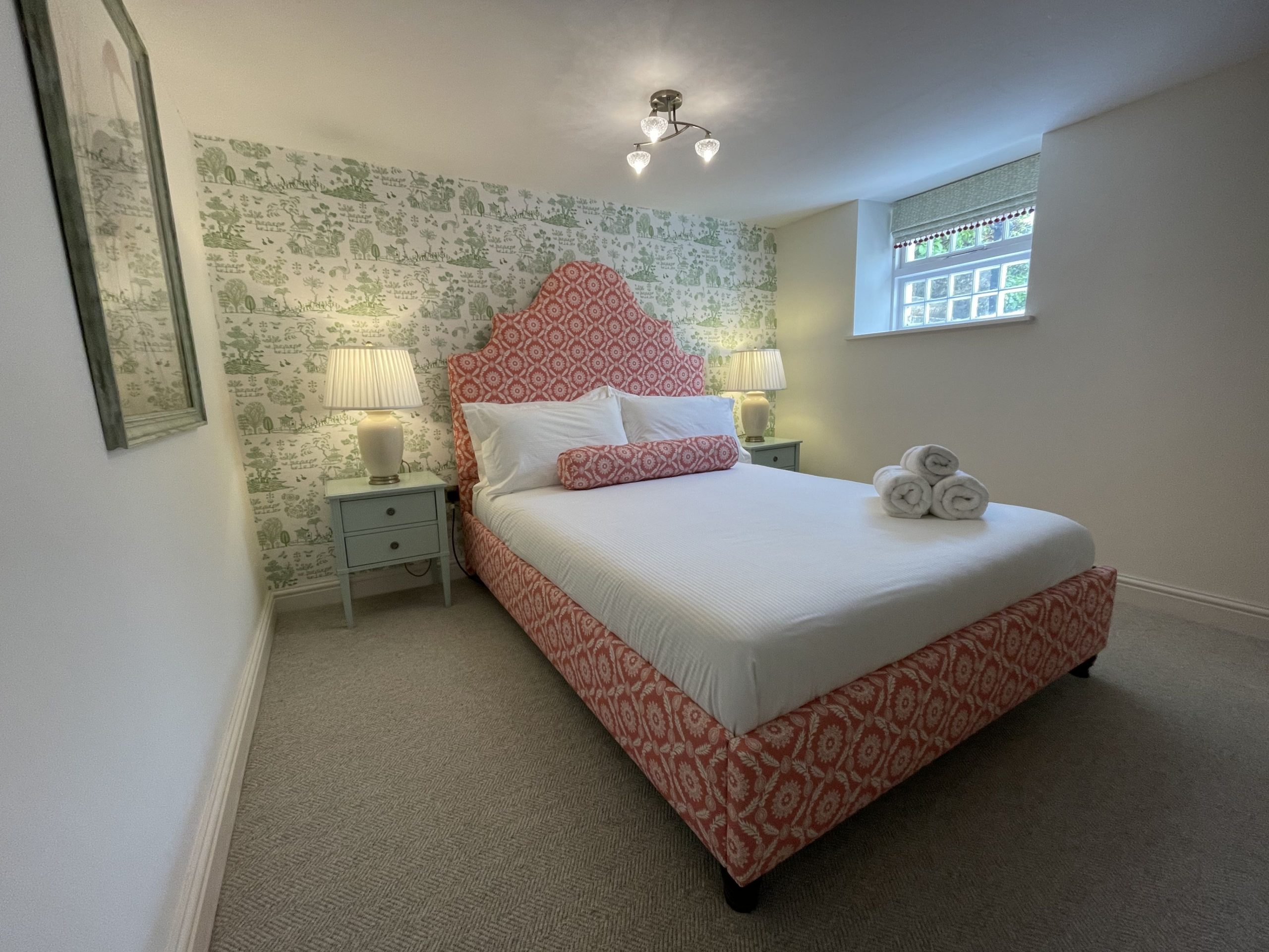 The master bedroom is found on the lower floor of the property and features a double bed