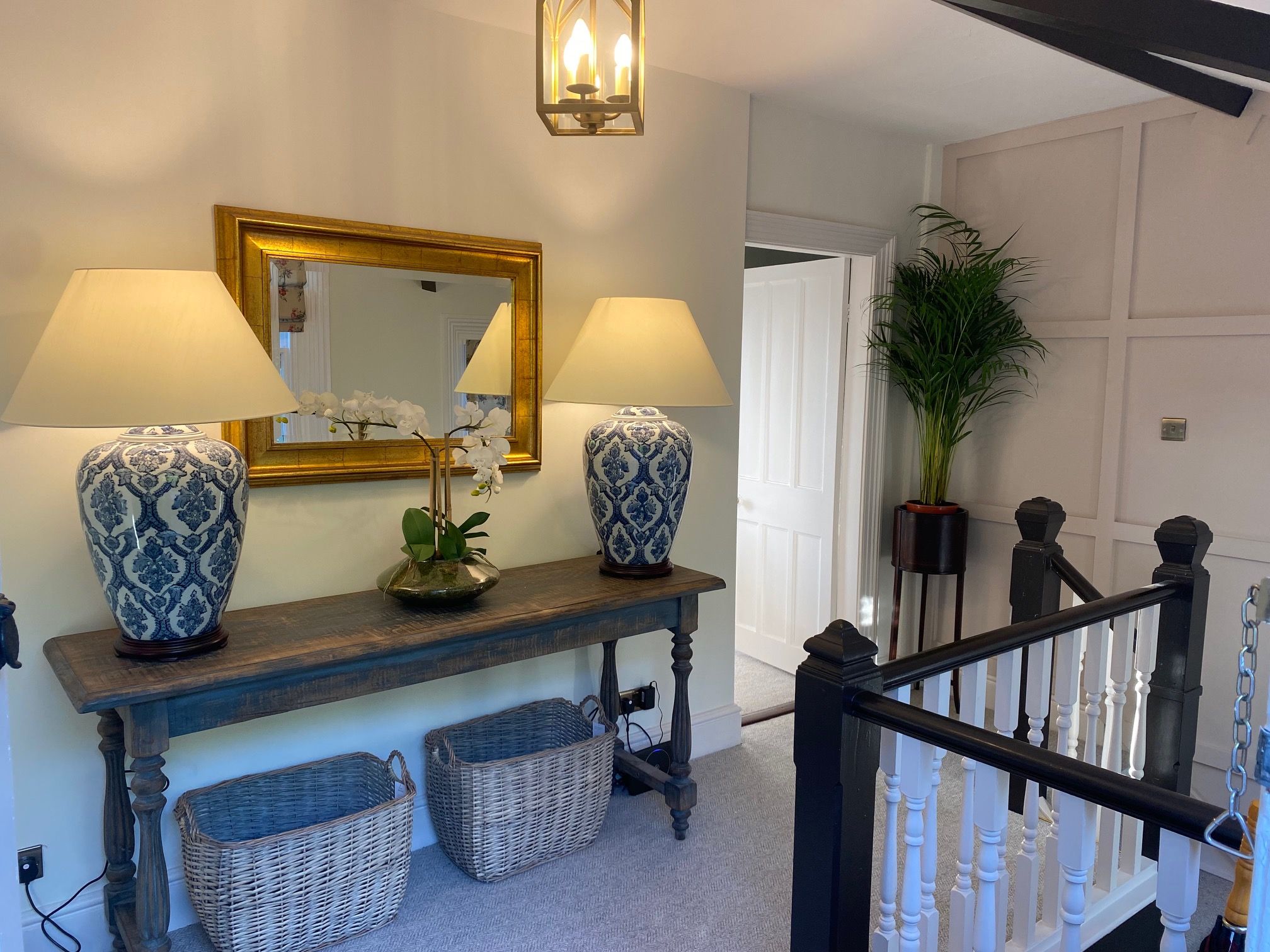 On the upper level of the property you will find the main bathroom, kitchen and living area