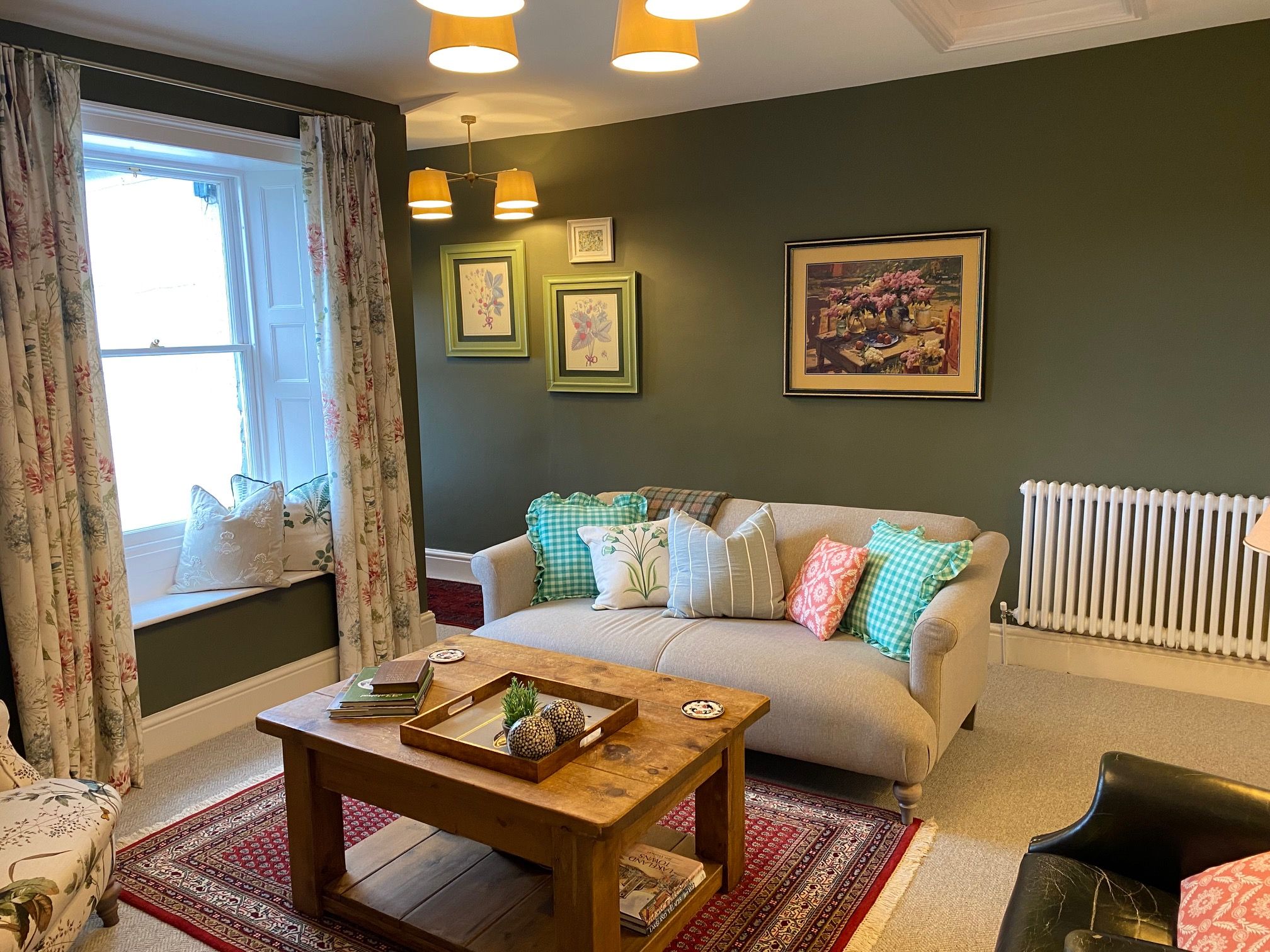 There is a cosy settee and 2 armchairs for people to relax on and enjoy TV