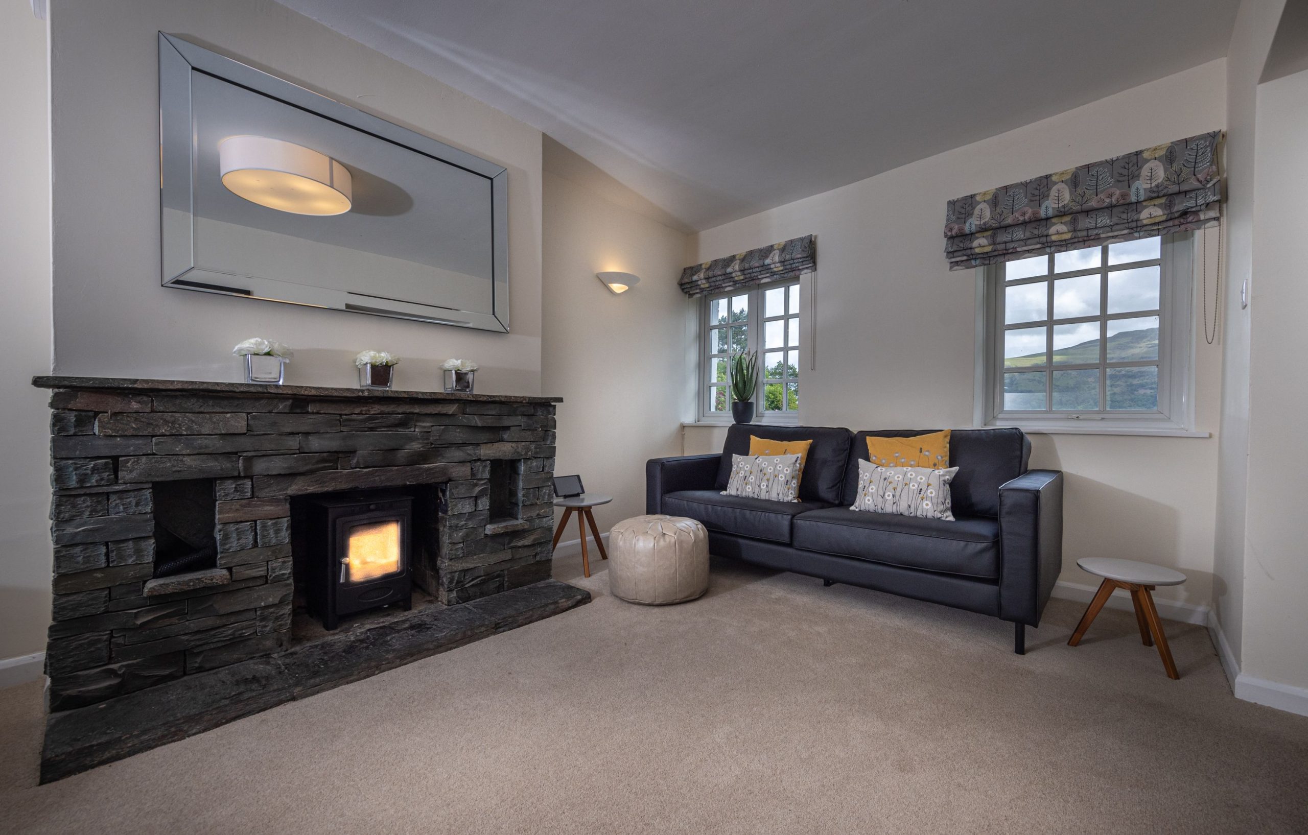 The log burning stove has a lovely slate surround