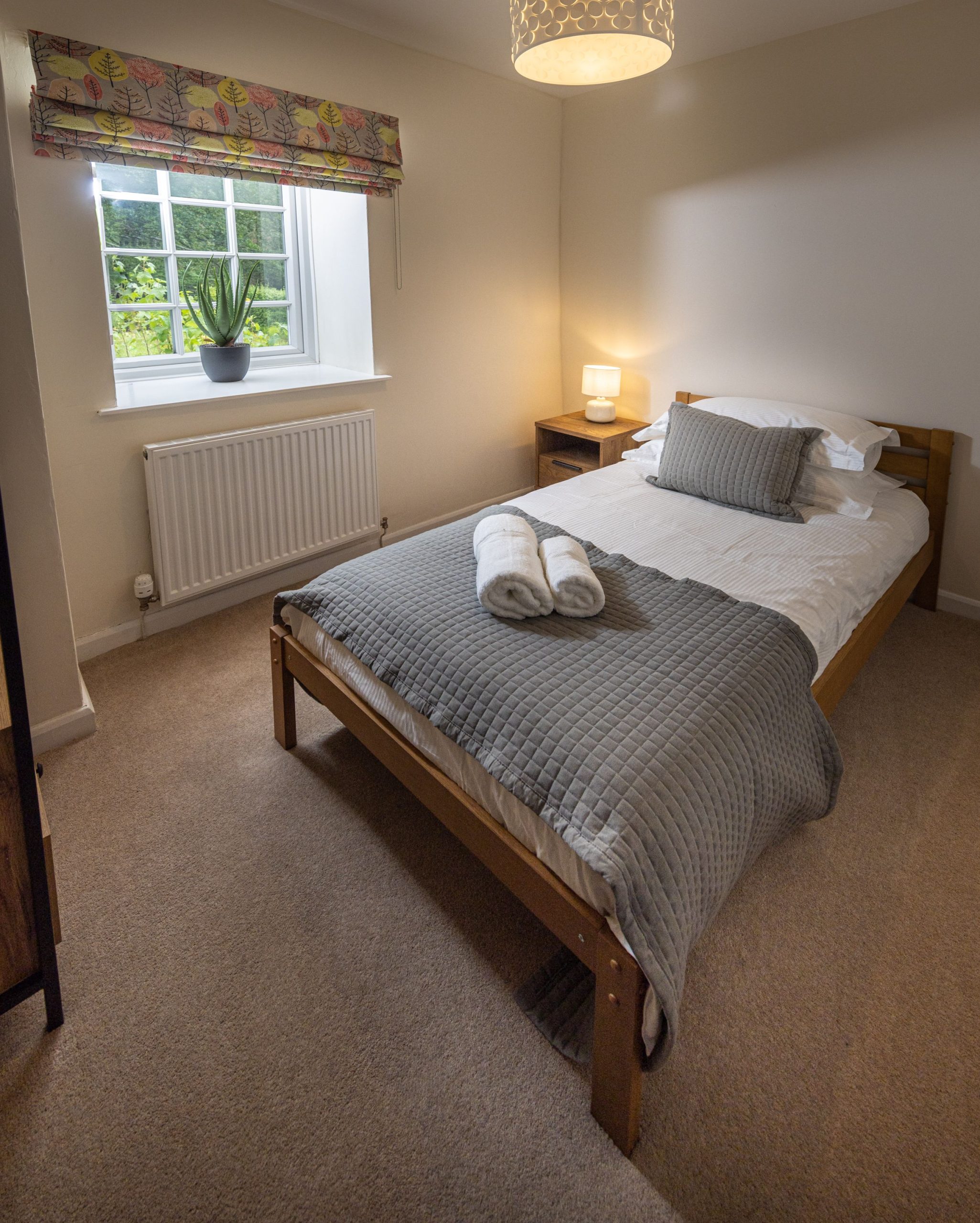 The single bedroom is cosy and peaceful