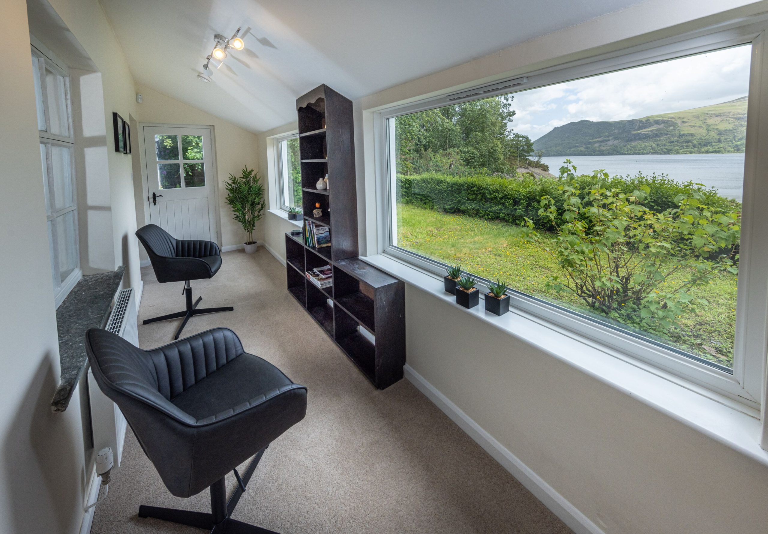 Sit and admire the views from the upstairs hallway, this would be the perfect place to prop up an easel for painting