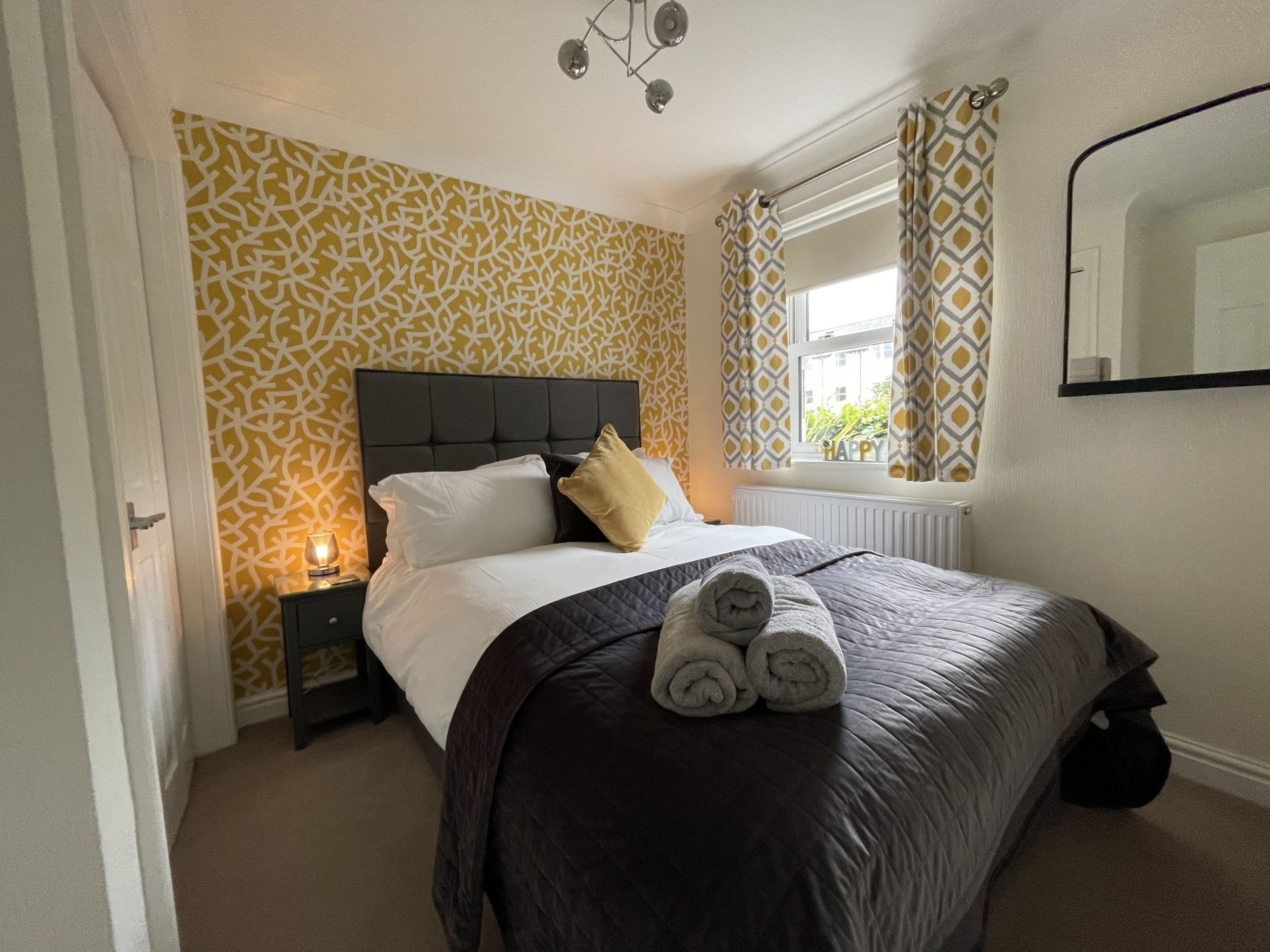 The second bedroom with double bed, located at the front of the property