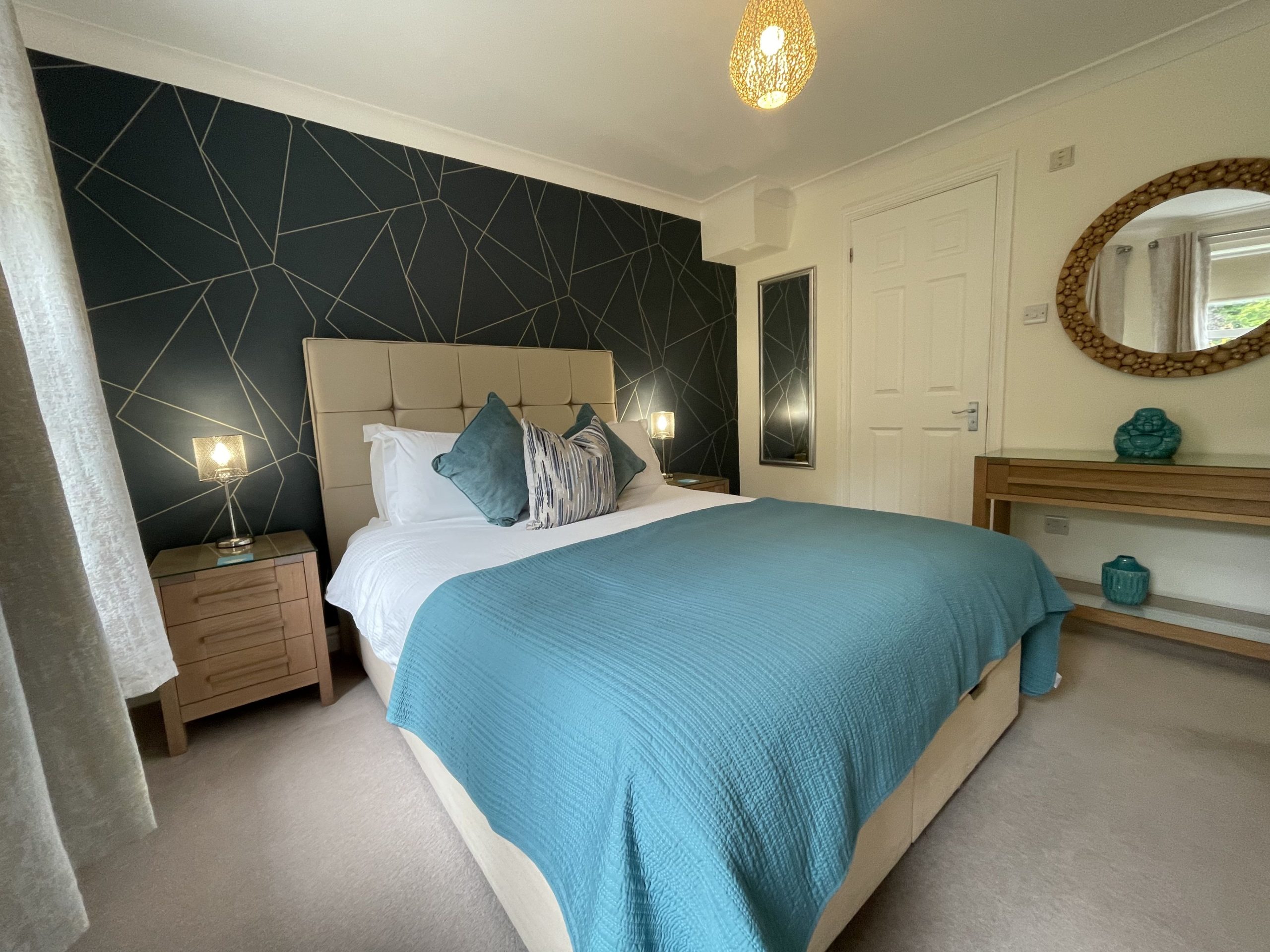 The master bedroom is at the front of the property