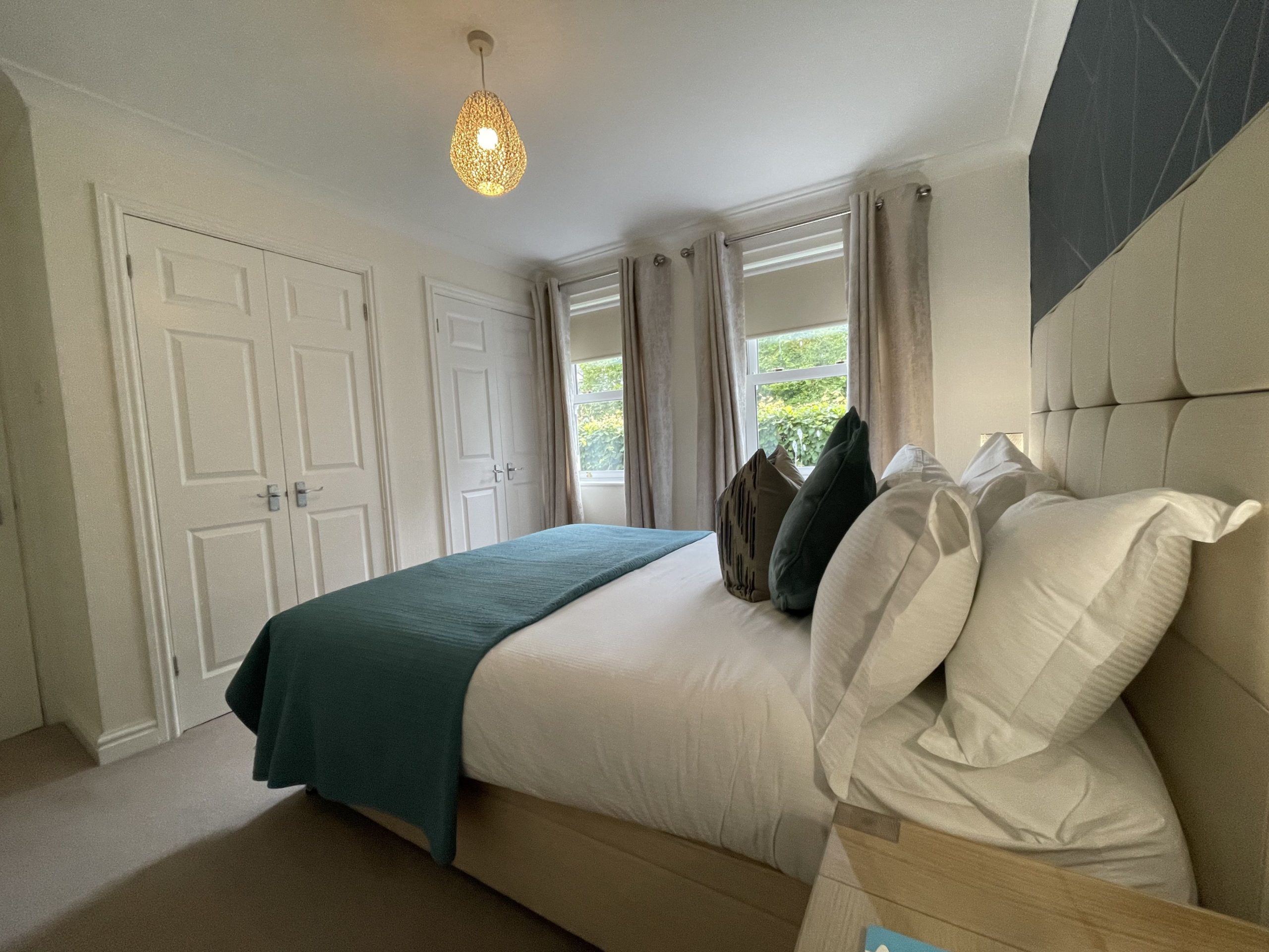 The room boasts fitted wardrobes with plenty of space for all your luggage