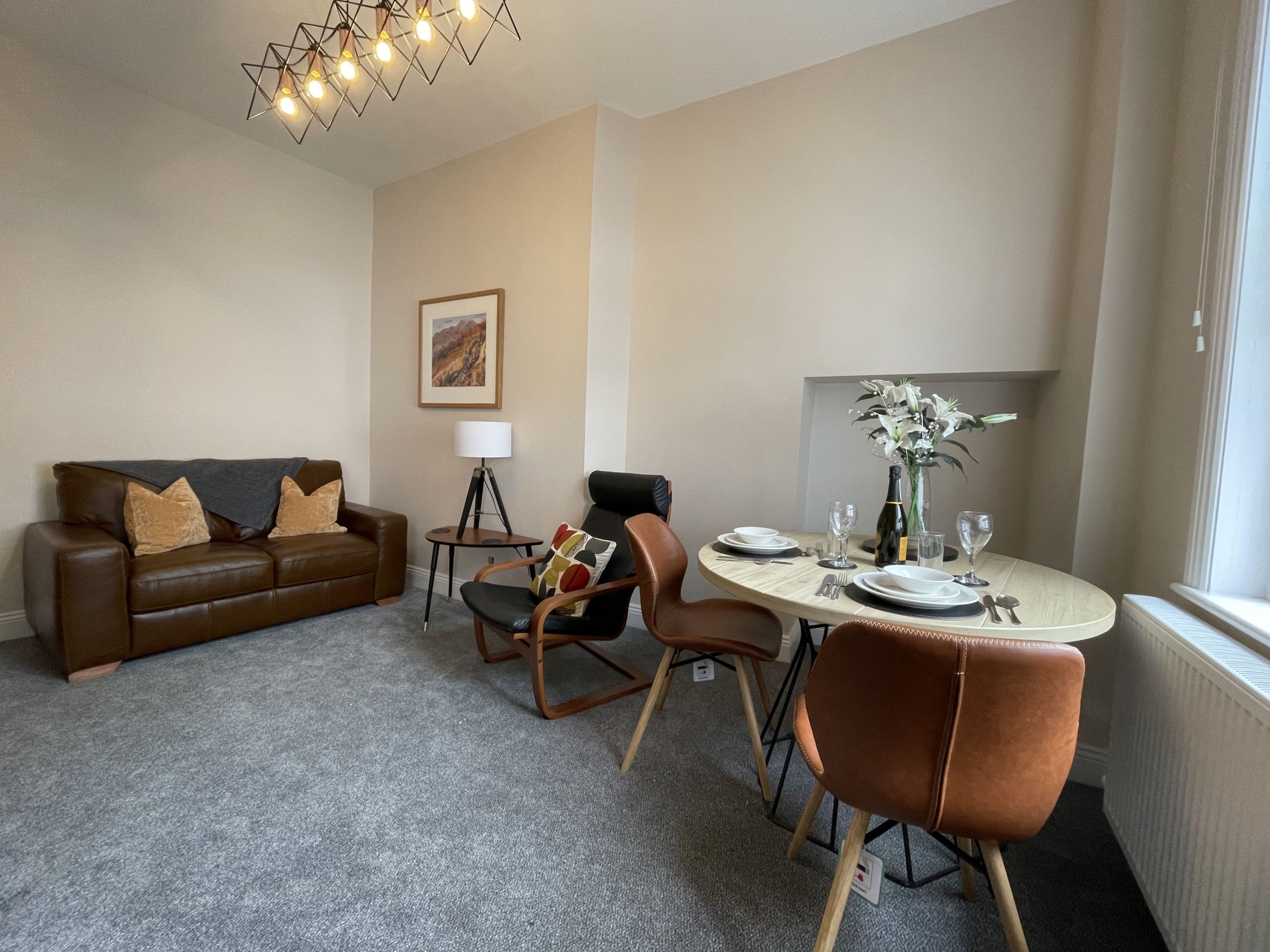 Enjoy the view from the large windows which look out over the main highstreet