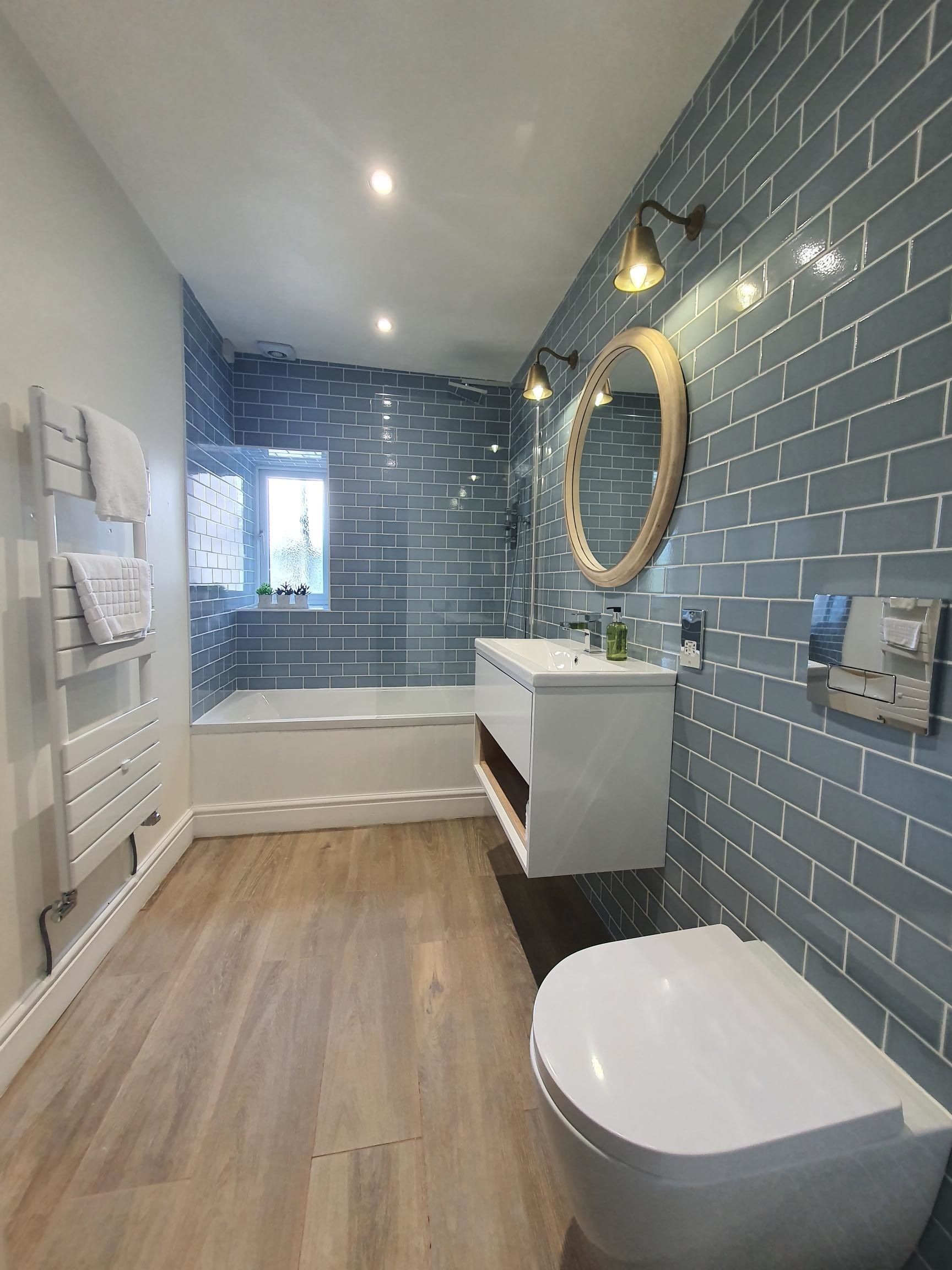A recently fitted bathroom can be found at the rear of the property