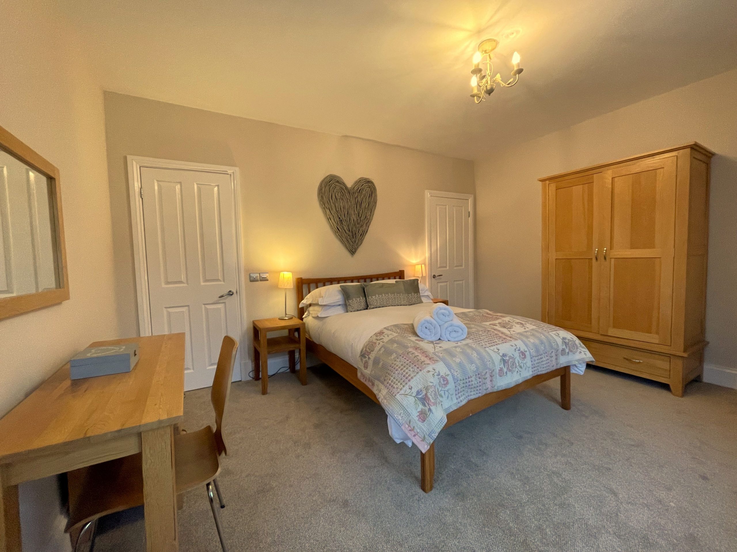 The first floor double bedroom benefits from an ensuite shower room