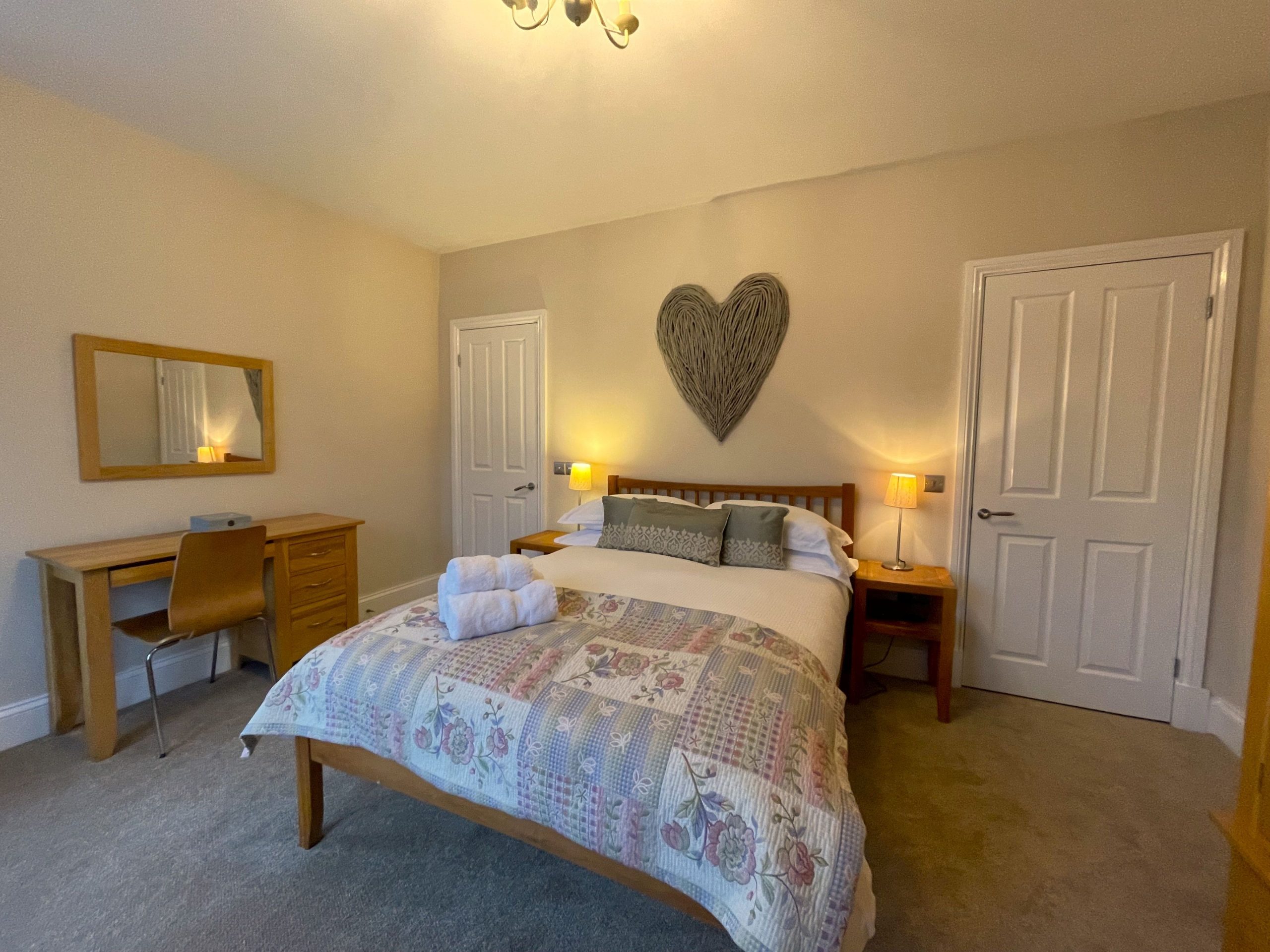 You will find a double bed, dressing table, wardrobe and bedside tables in the first floor double room