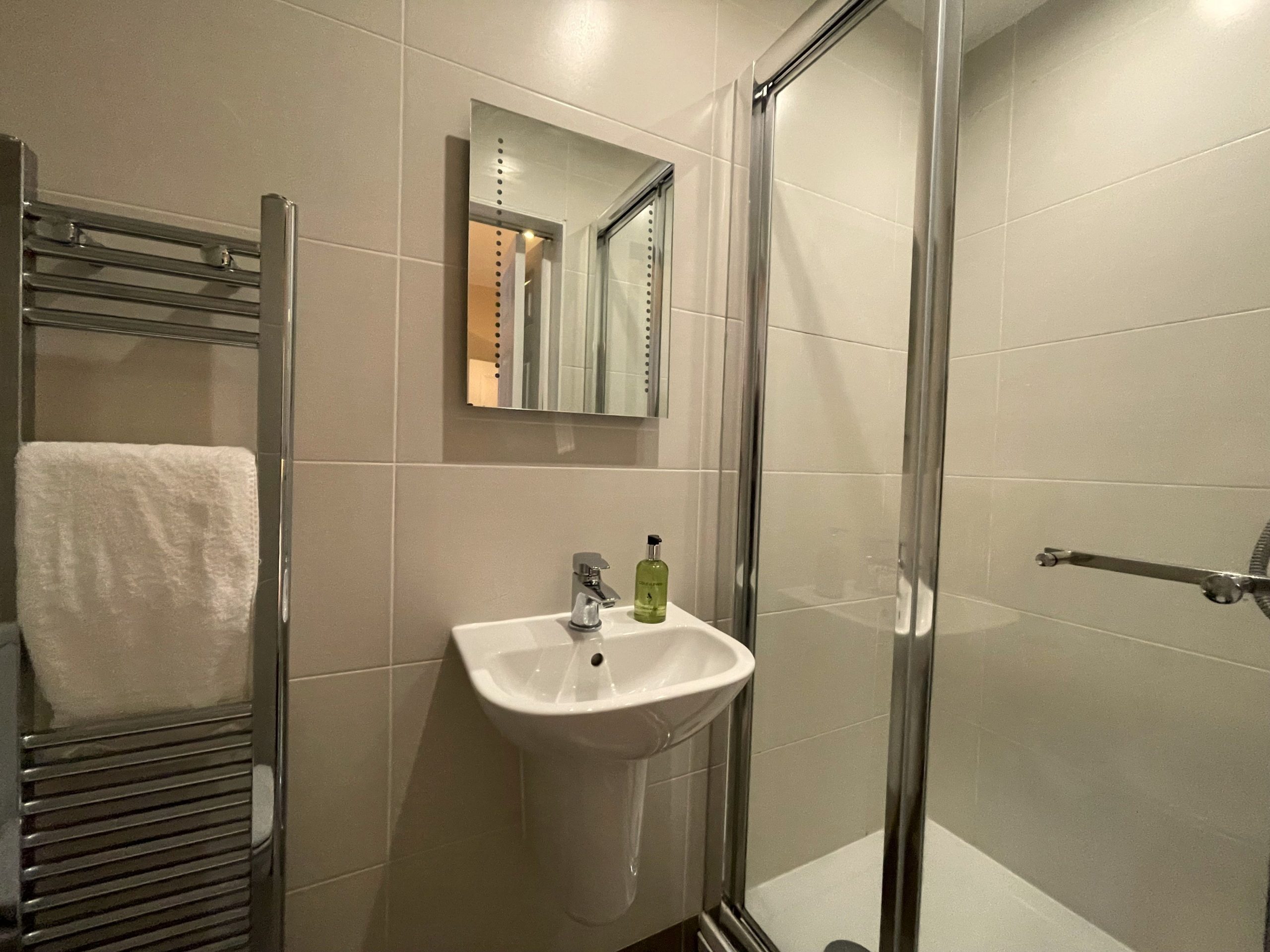 The second floor ensuite comprises walk in shower, WC, sink and heated towel rail
