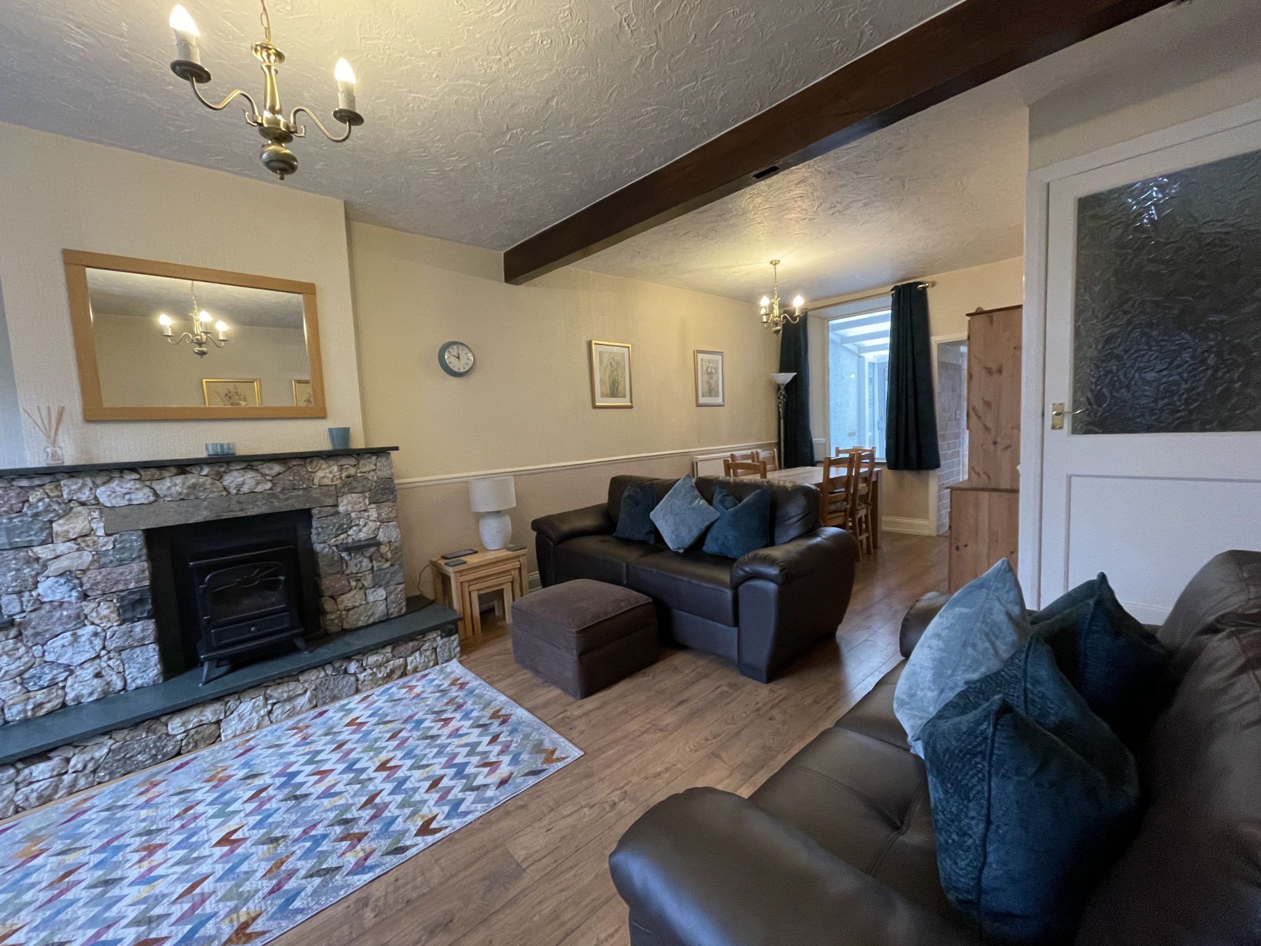 Beautiful cottage lounge with slate and mineral hearth