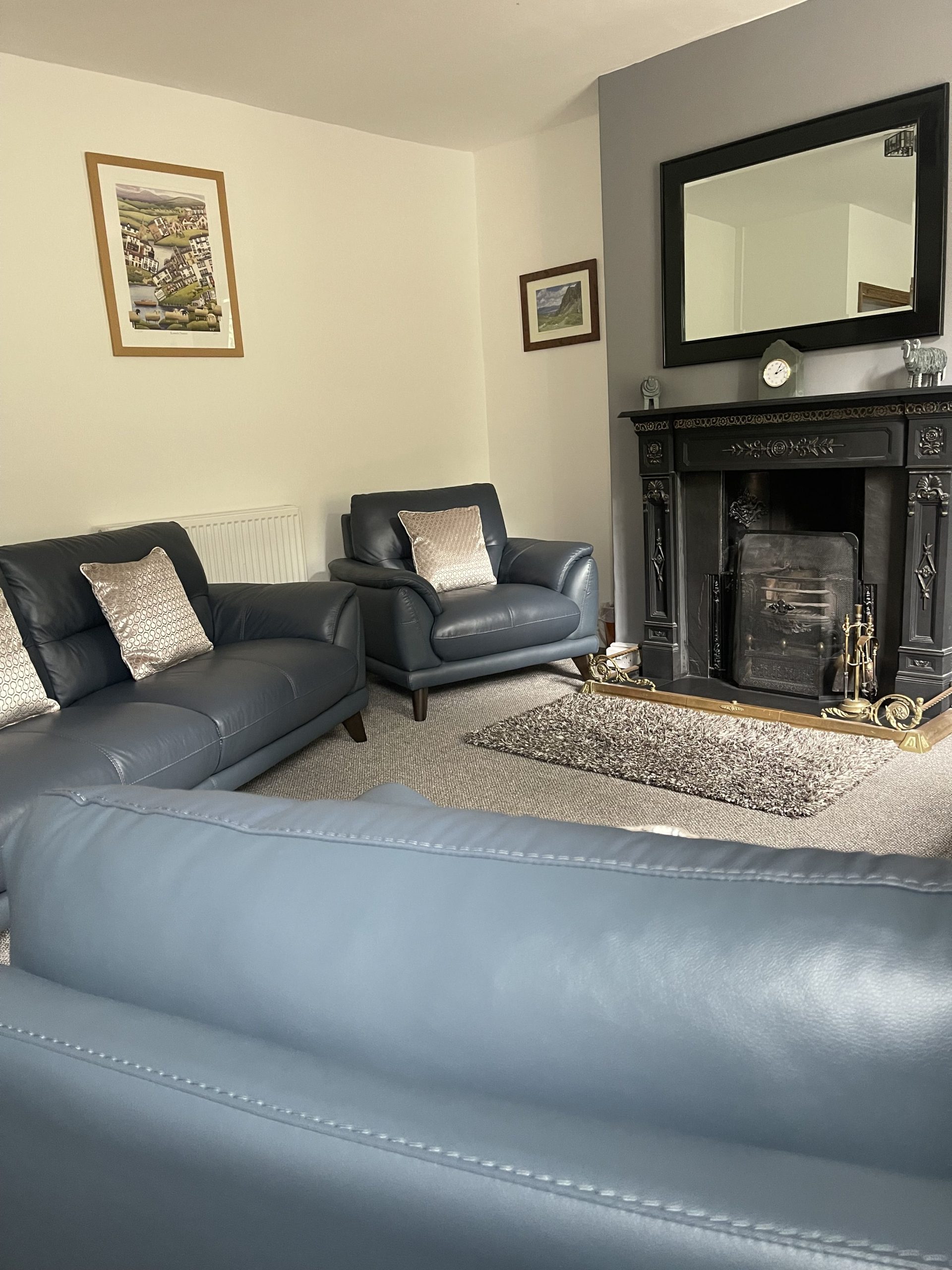 The living area is spacious and has plenty of seating for all the family