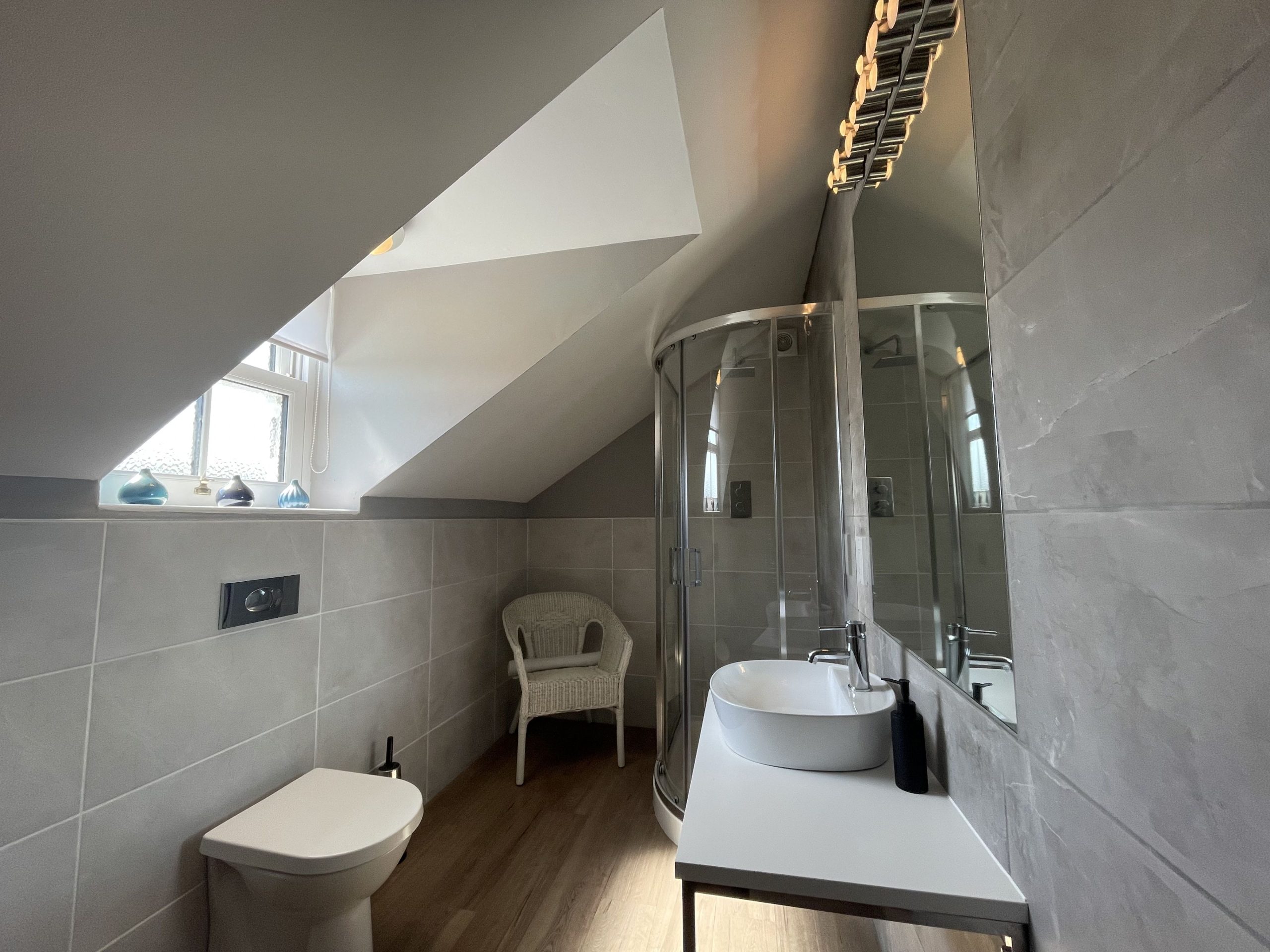 The second floor shower room comprises walk in shower, toilet and WC