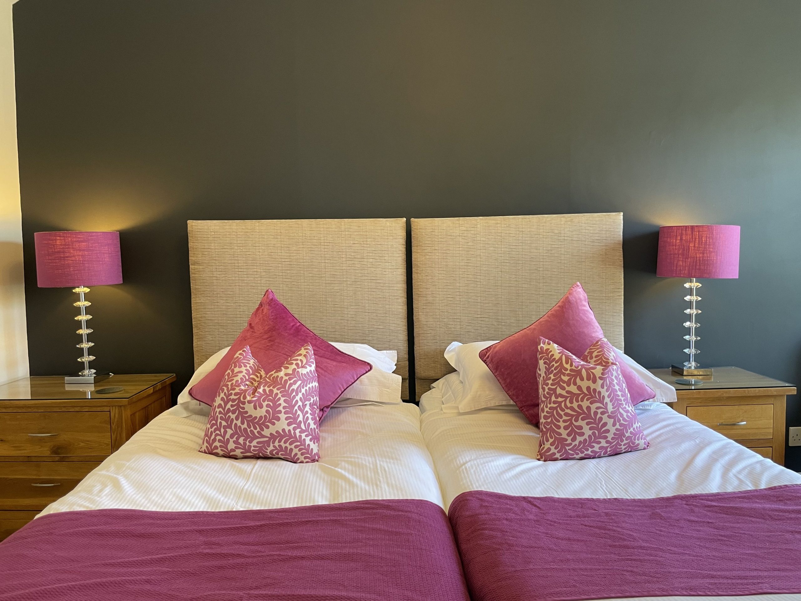 Luxury bed linen and towels are provided