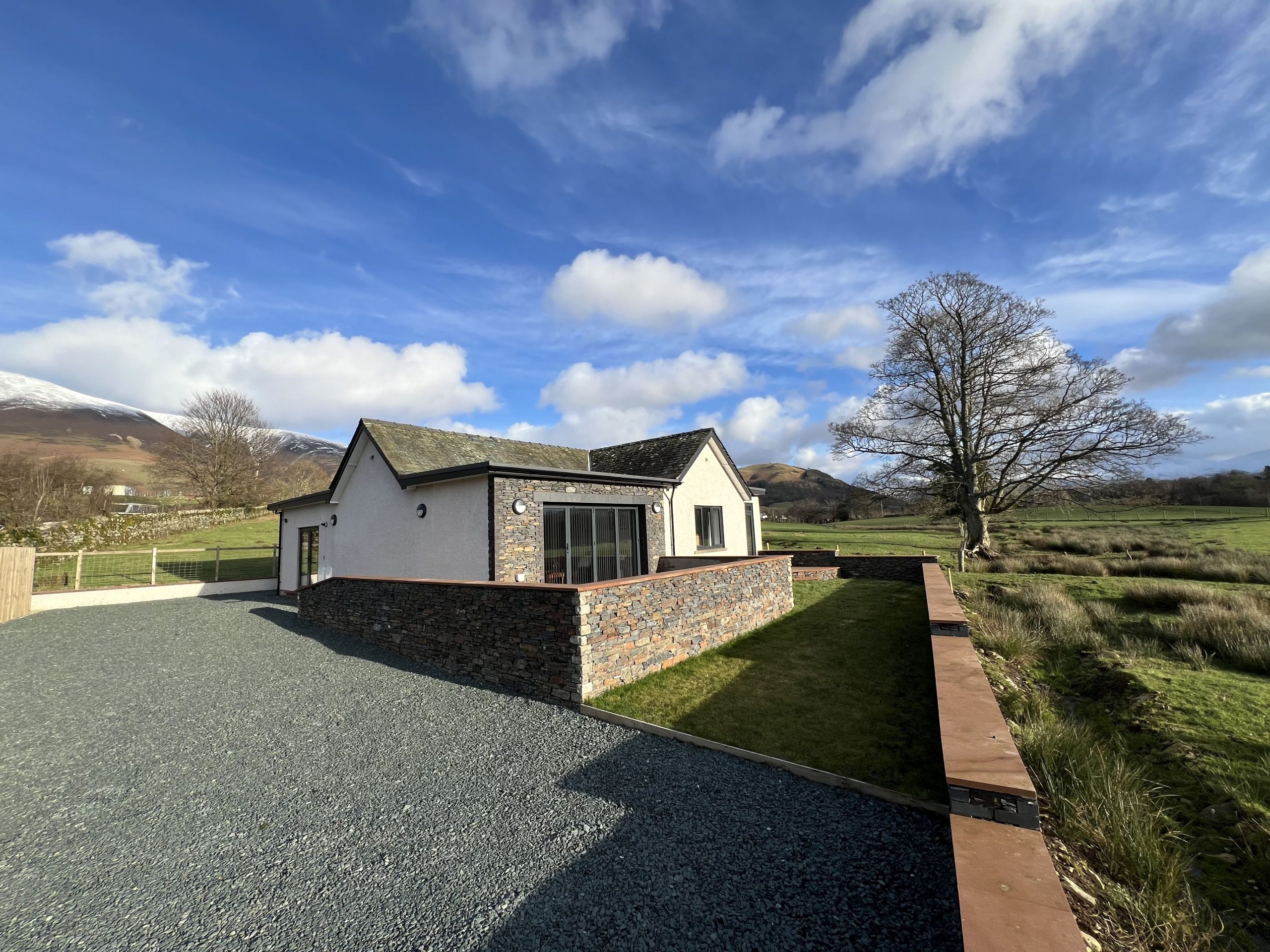 There is lots of space available for parking at Langrigg Cottage