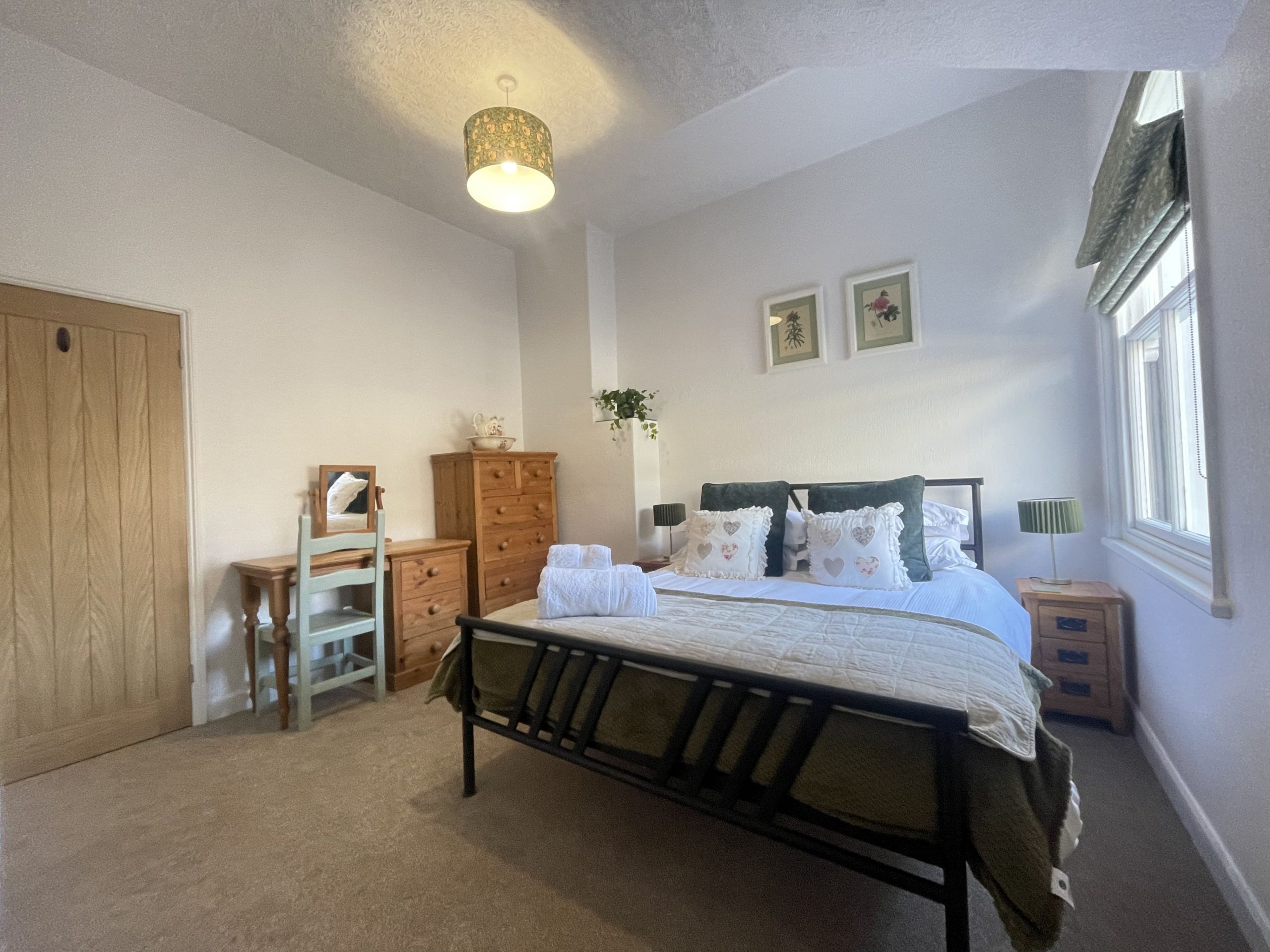 The master bedroom has a king sized bed and there is room for a cot if required