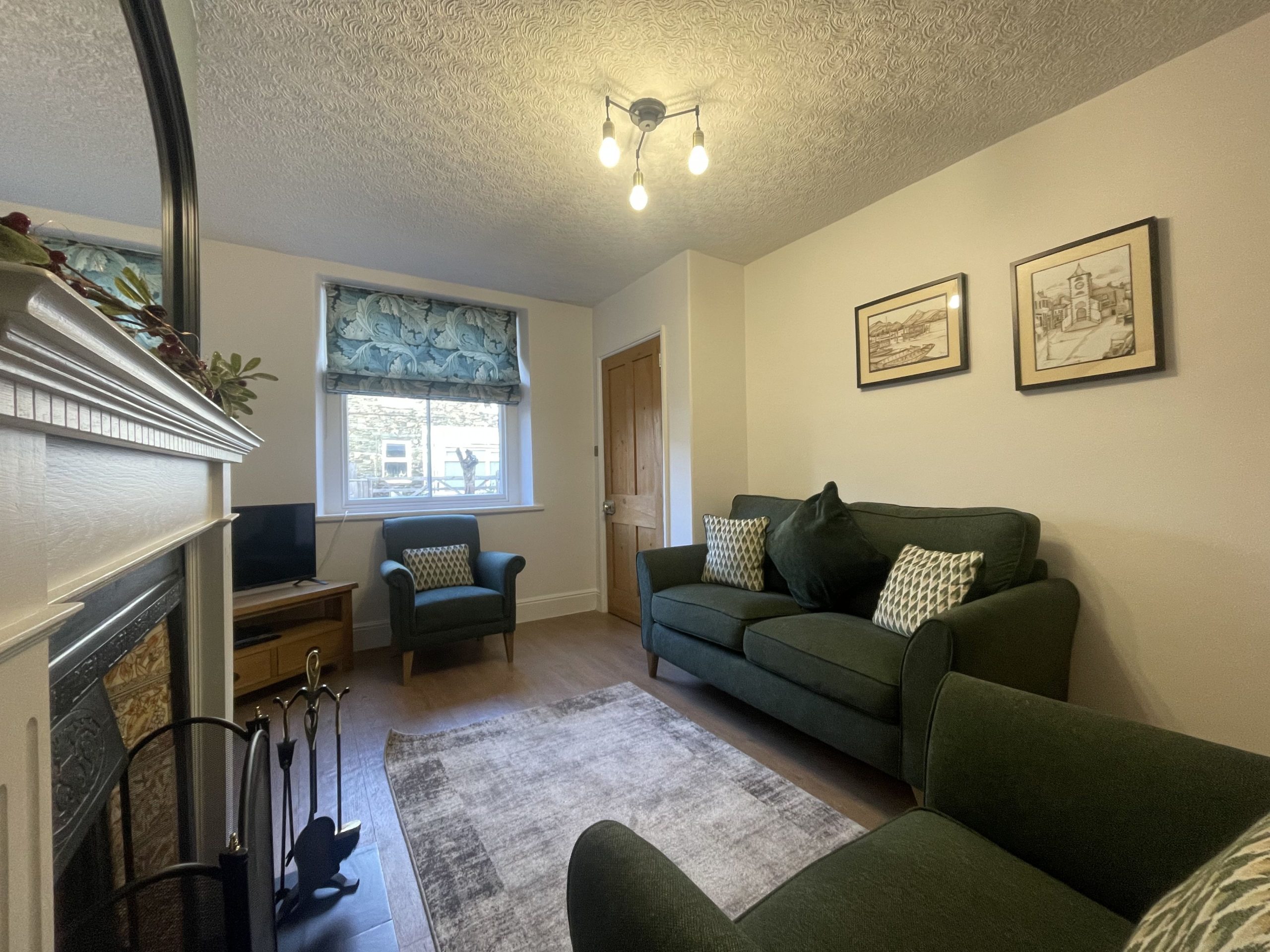 There is plenty of space in the living room for everyone to relax