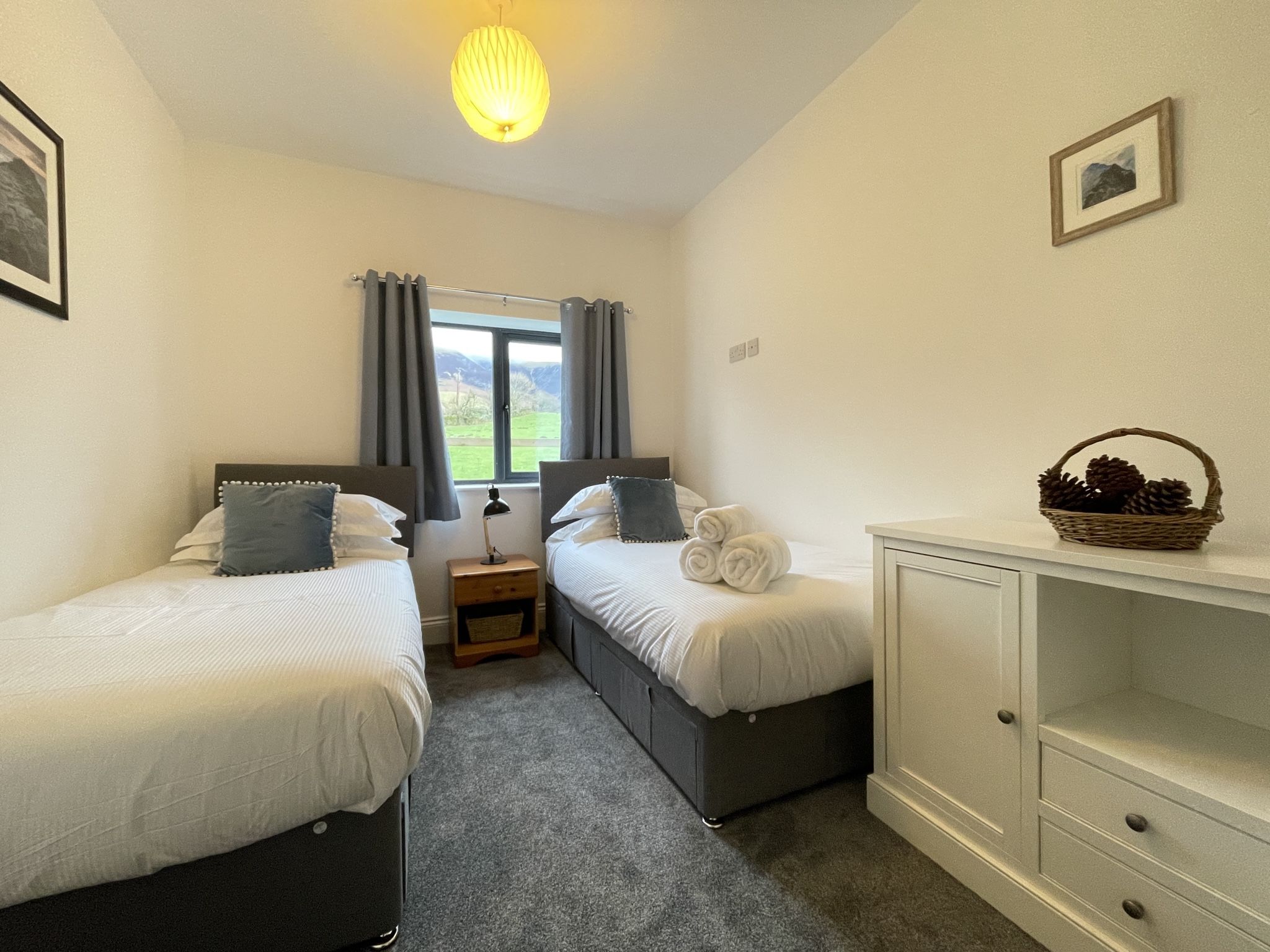 The third bedroom has two single beds 
