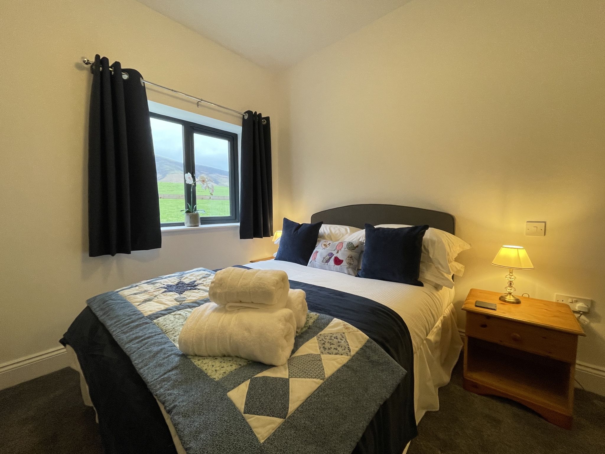 This bedroom enjoys views towards the Skiddaw range