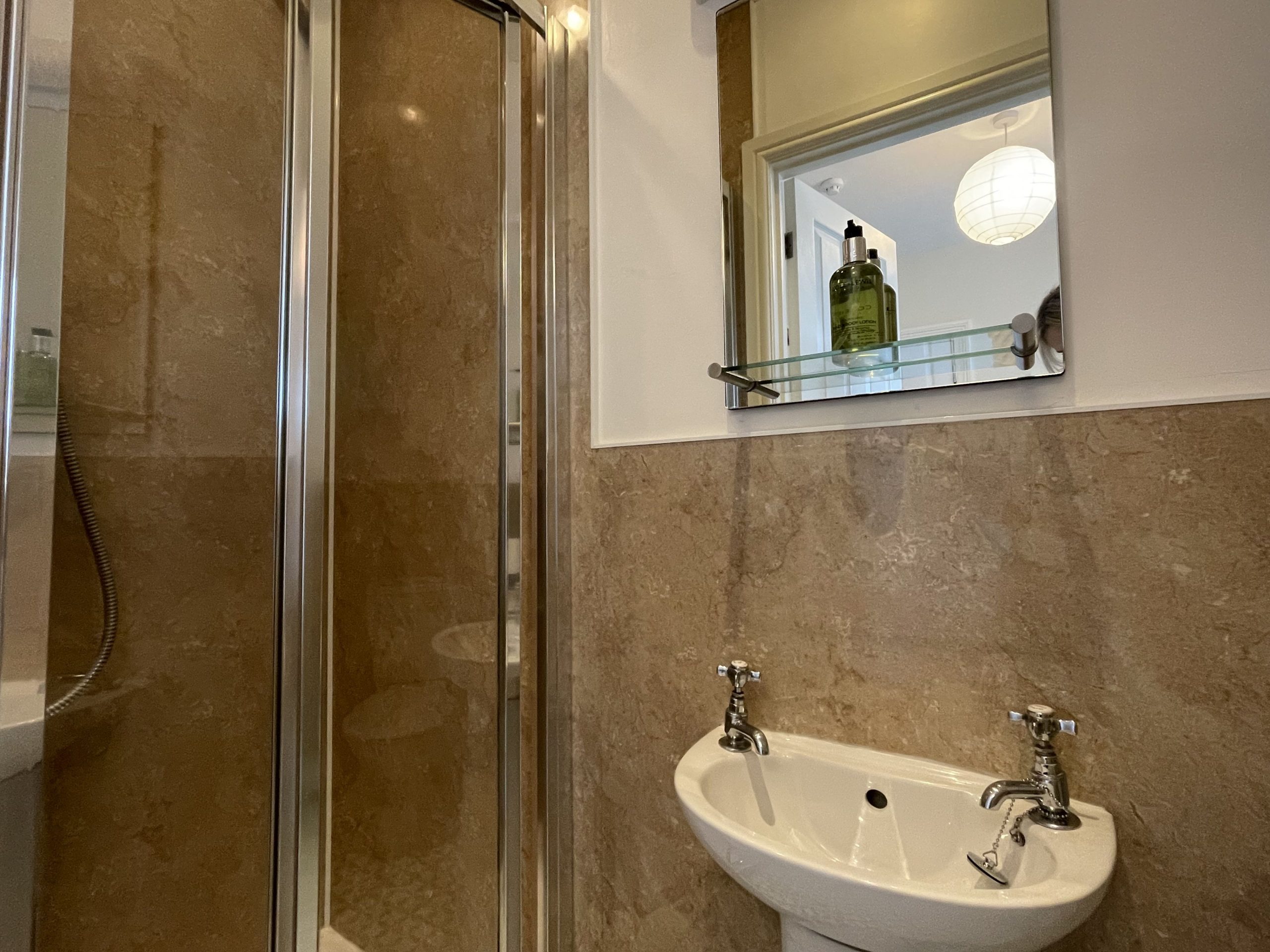 The master bedroom features an ensuite shower room