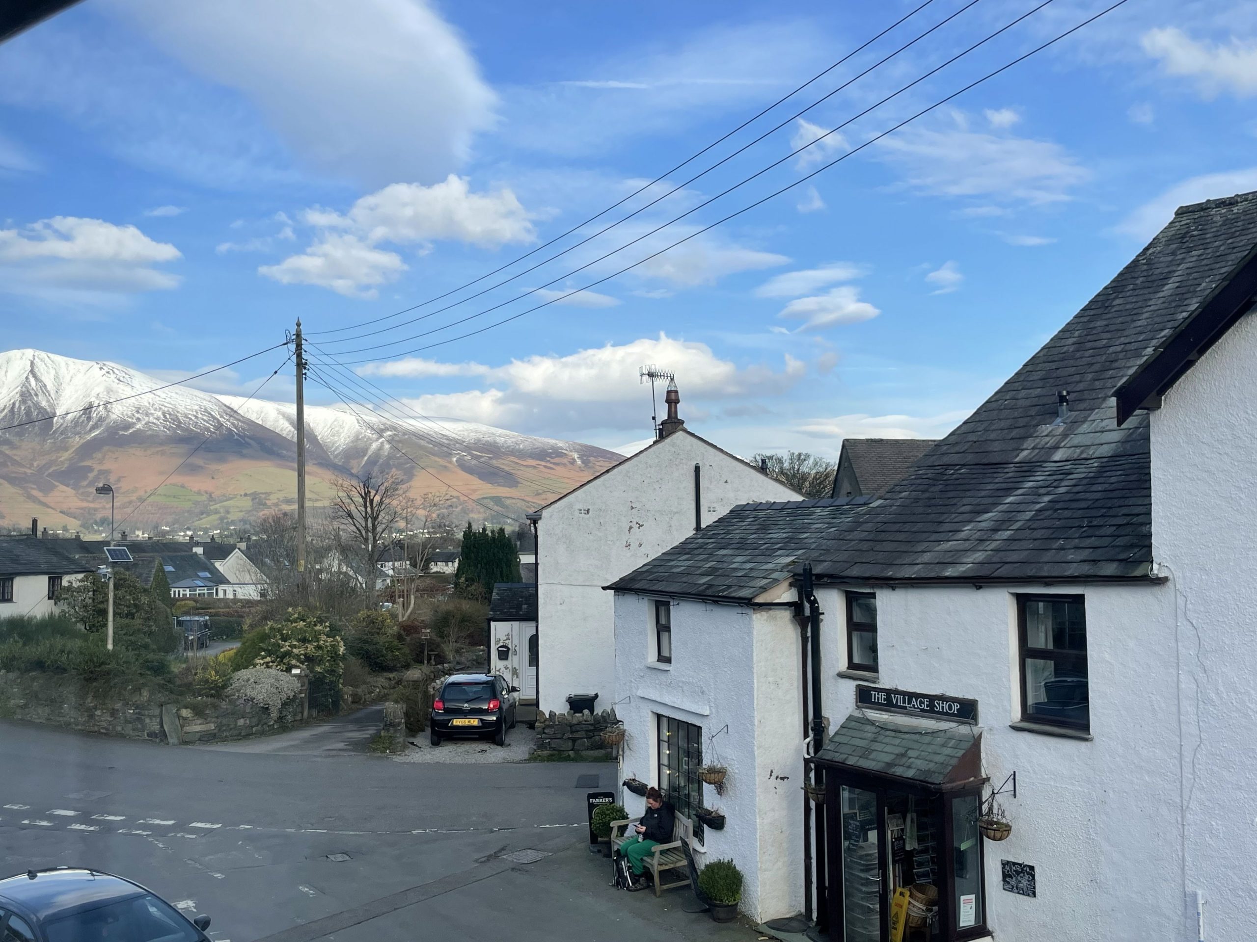 You have views to the local shop and the fells beyond
