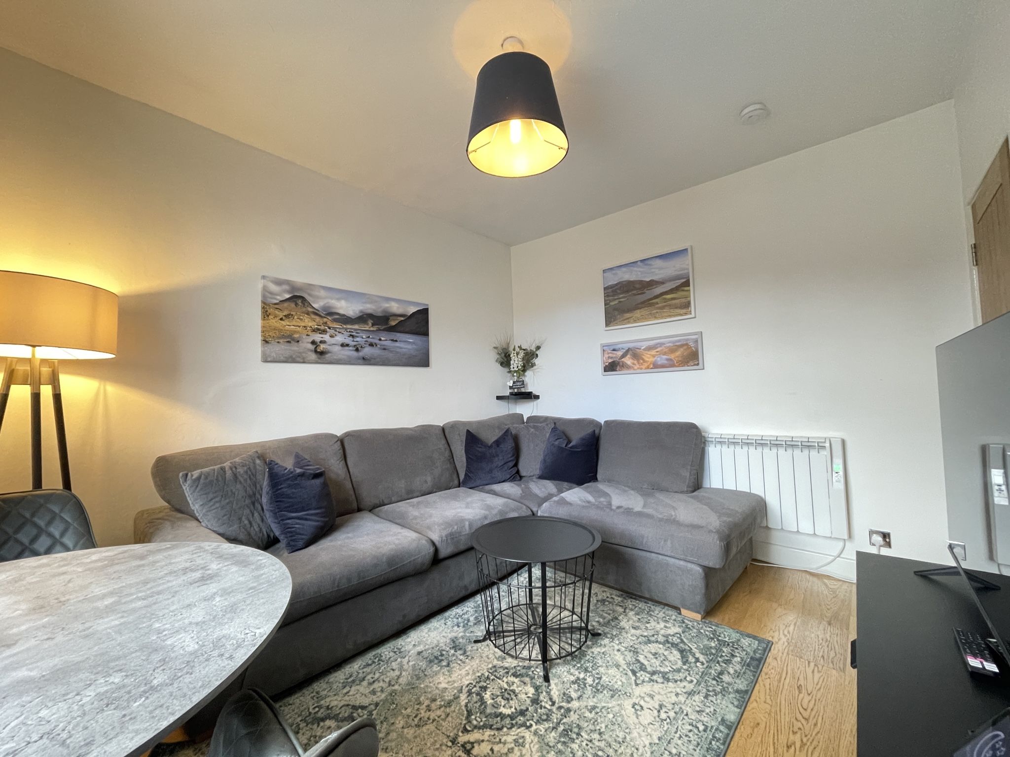 The living and dining area is beautifully decorated - perfect for cosy nights in