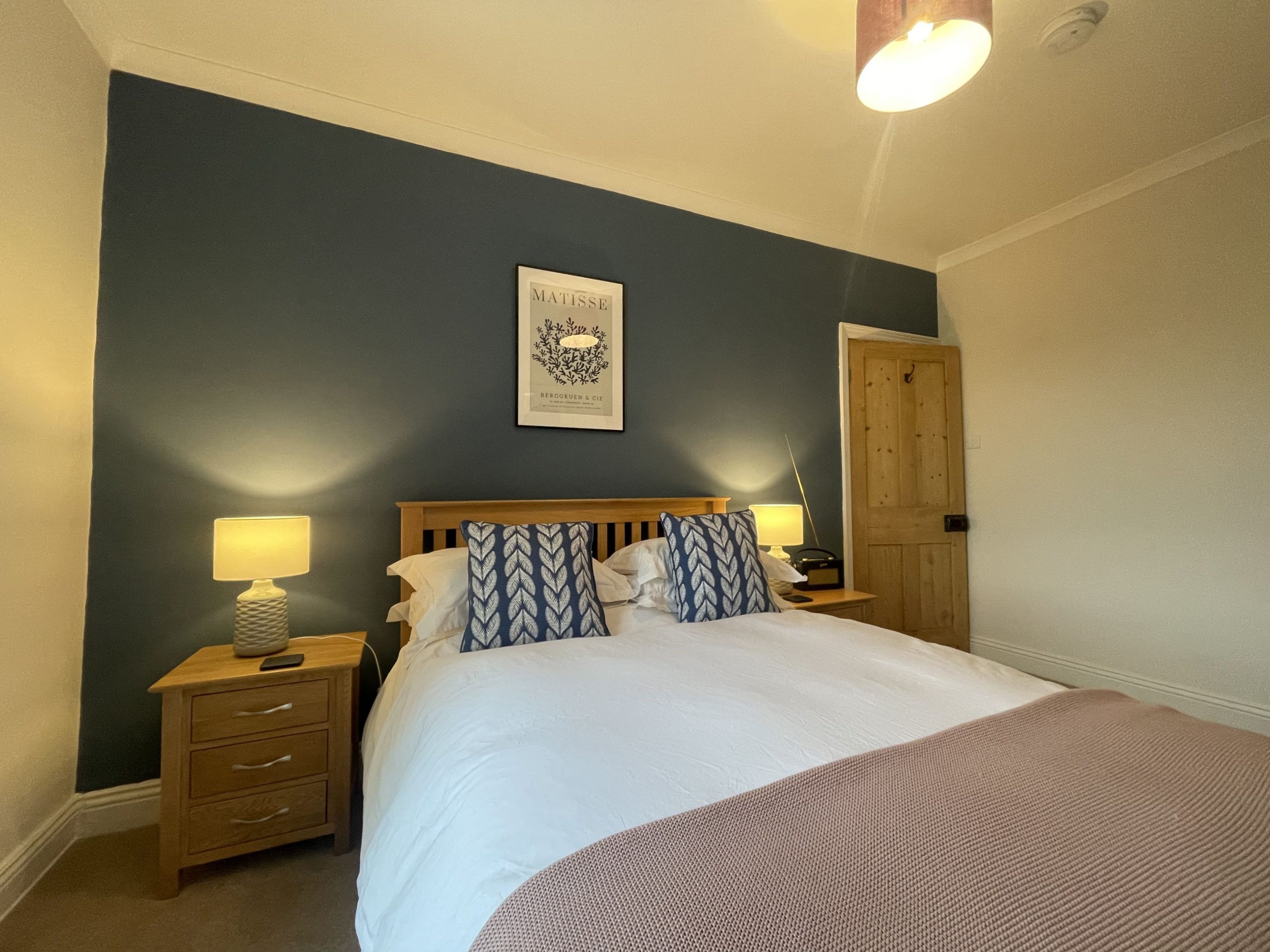 The refined master bedroom at the rear of the property