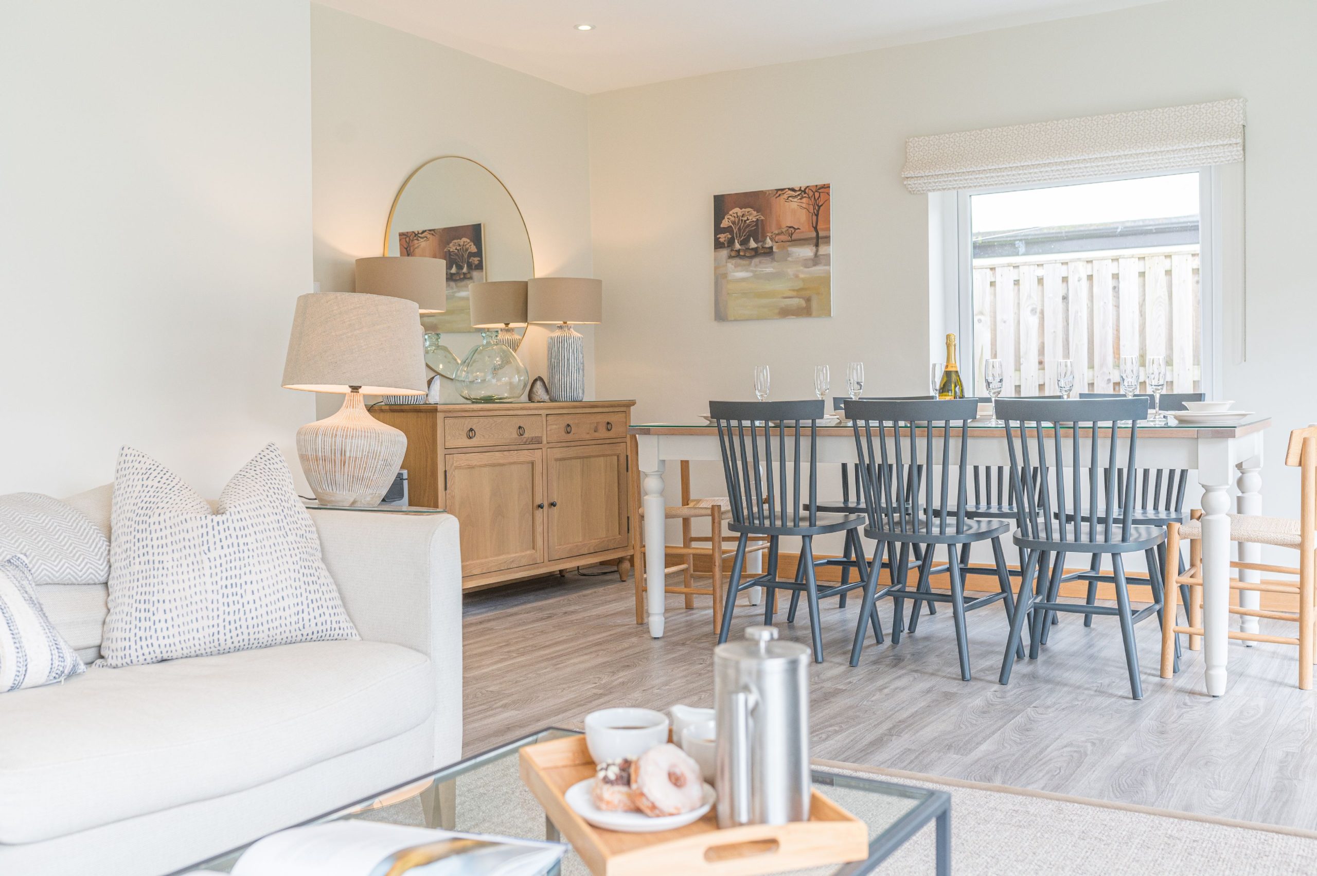 The large dining table will easily accommodate 8 people for dinner