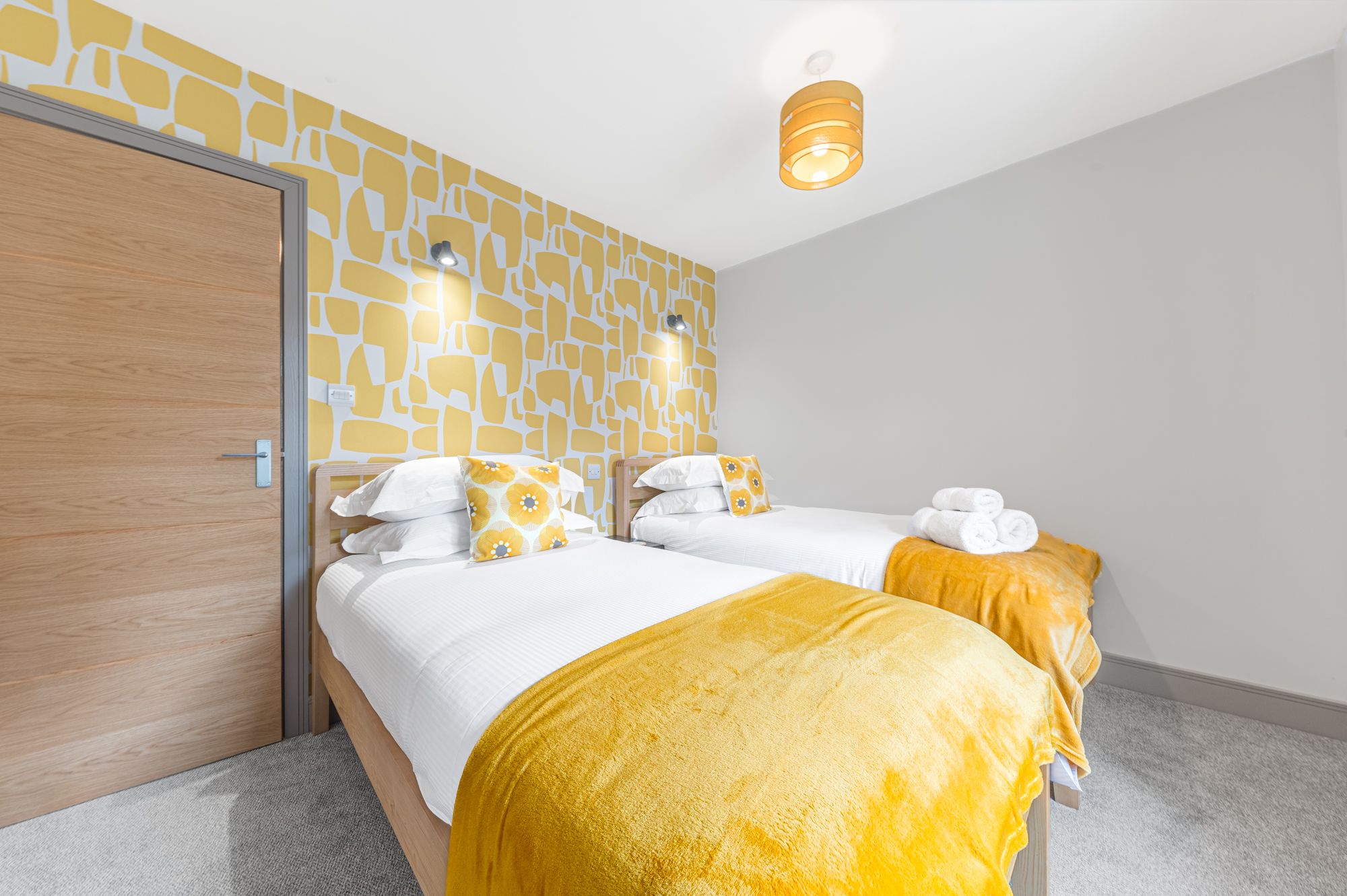 Upstairs, you can find a sunny twin room 