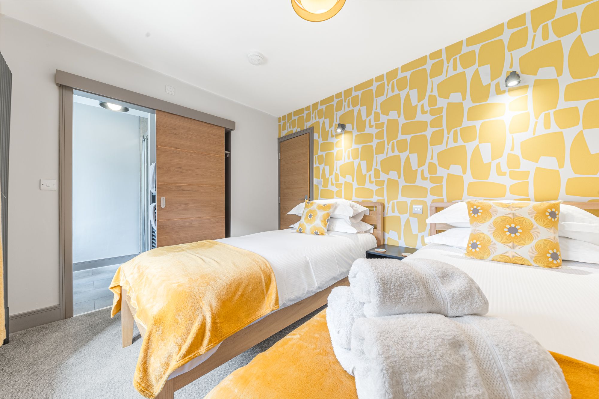 This bedroom benefits from an ensuite shower room