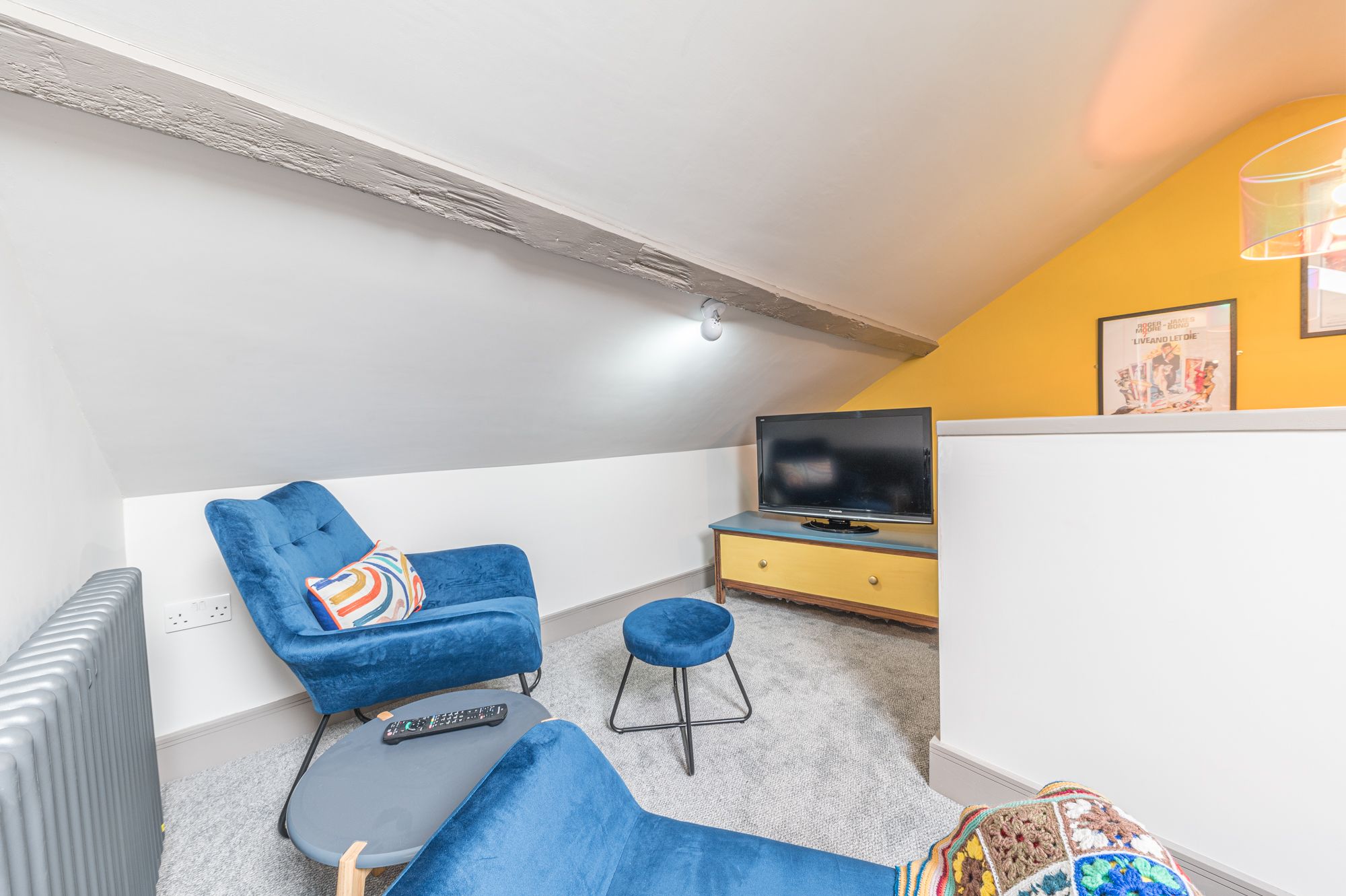 Children will love the hideaway room in the loft space