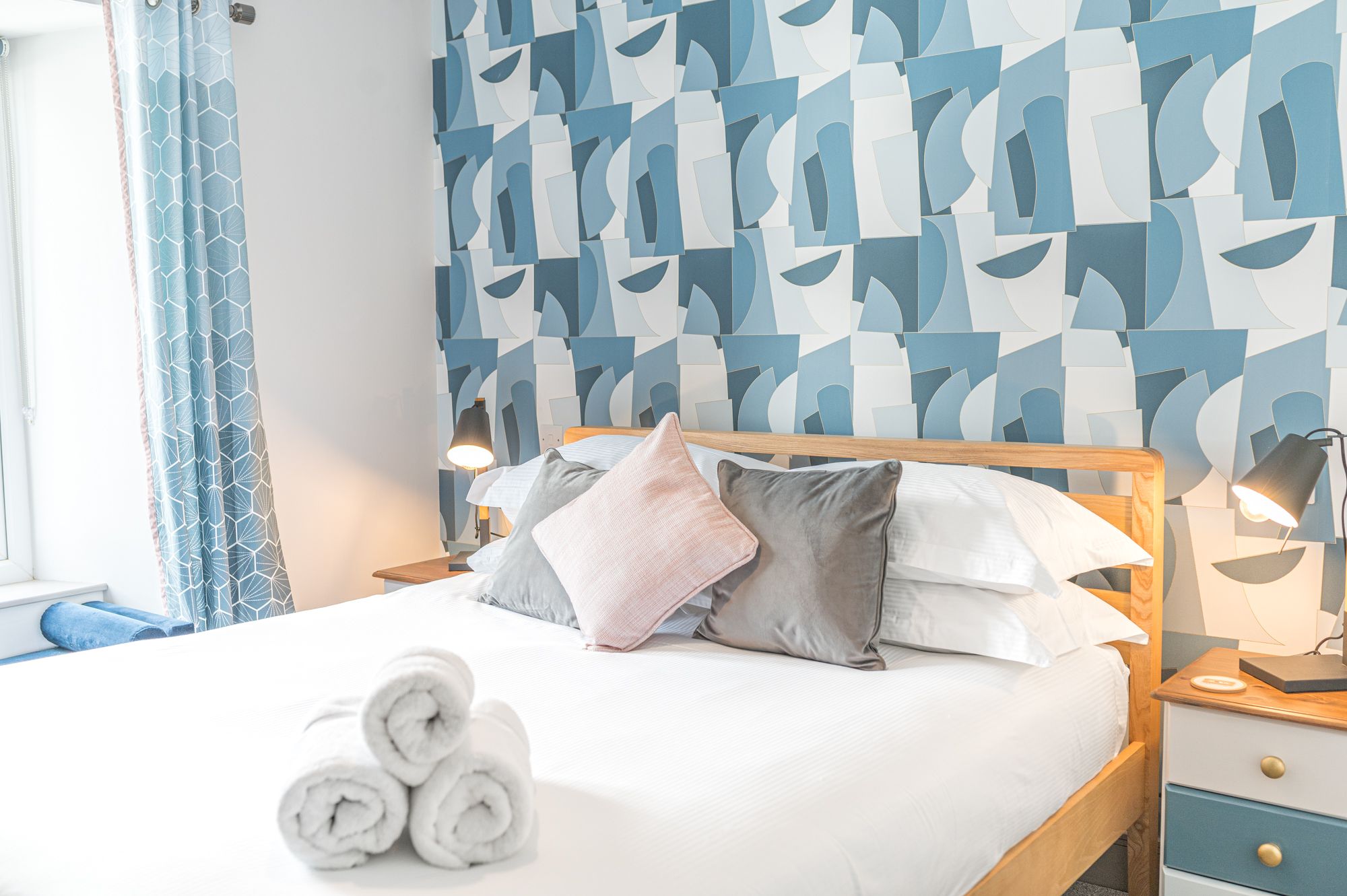 Towels and luxury bed linens are provided