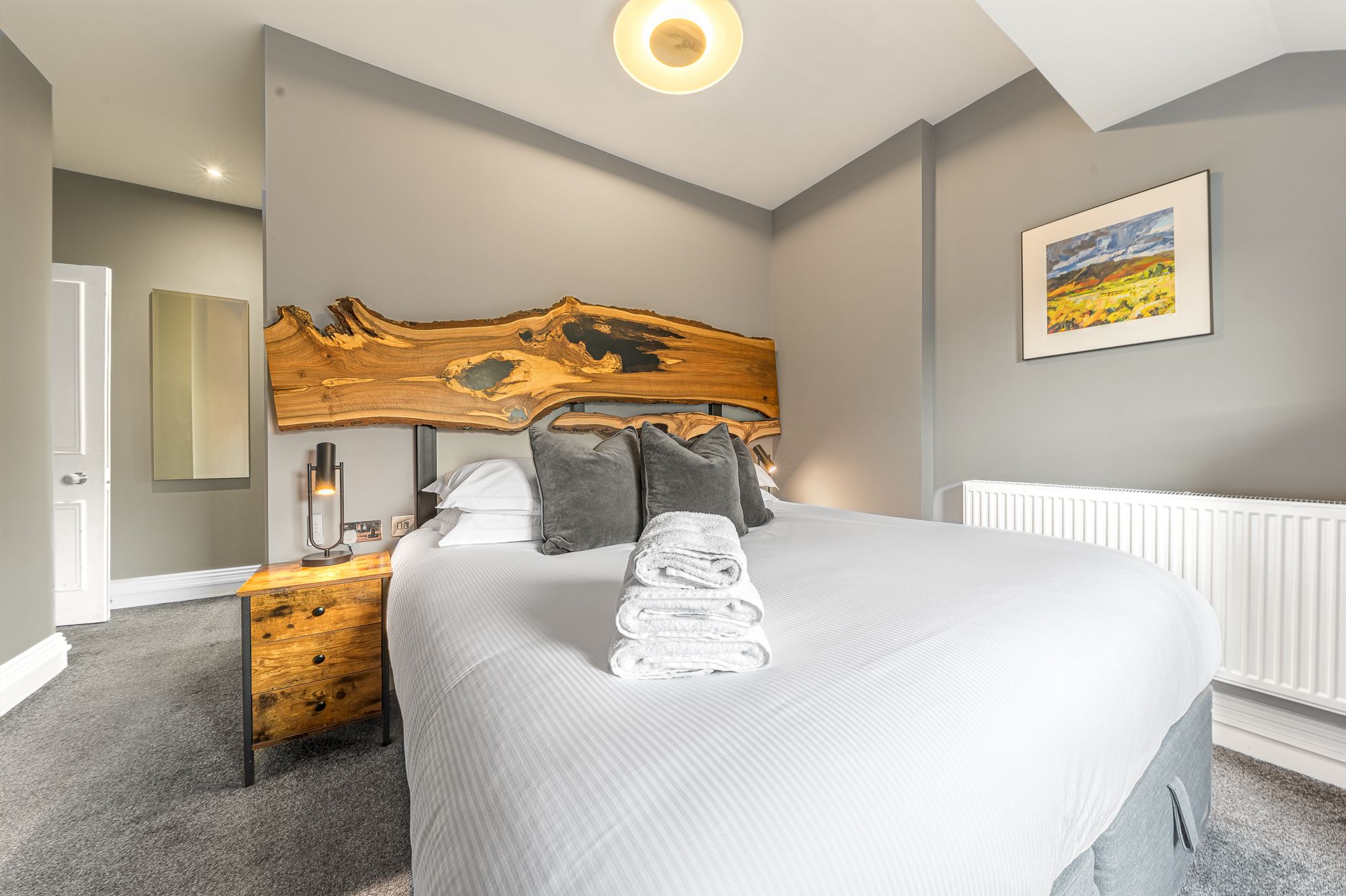 The fourth bedroom is located along the corridor on the second floor