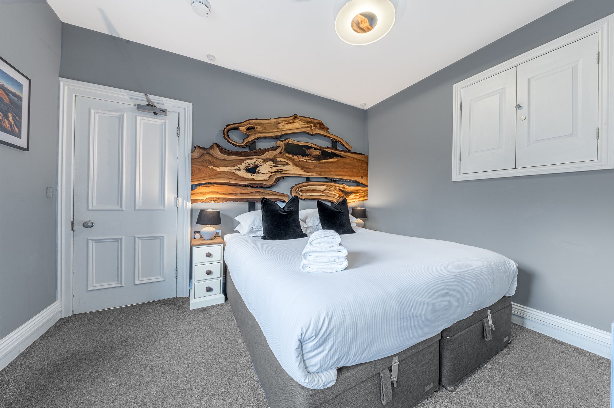 The fourth bedroom is also on the second floor and features a super-king bed