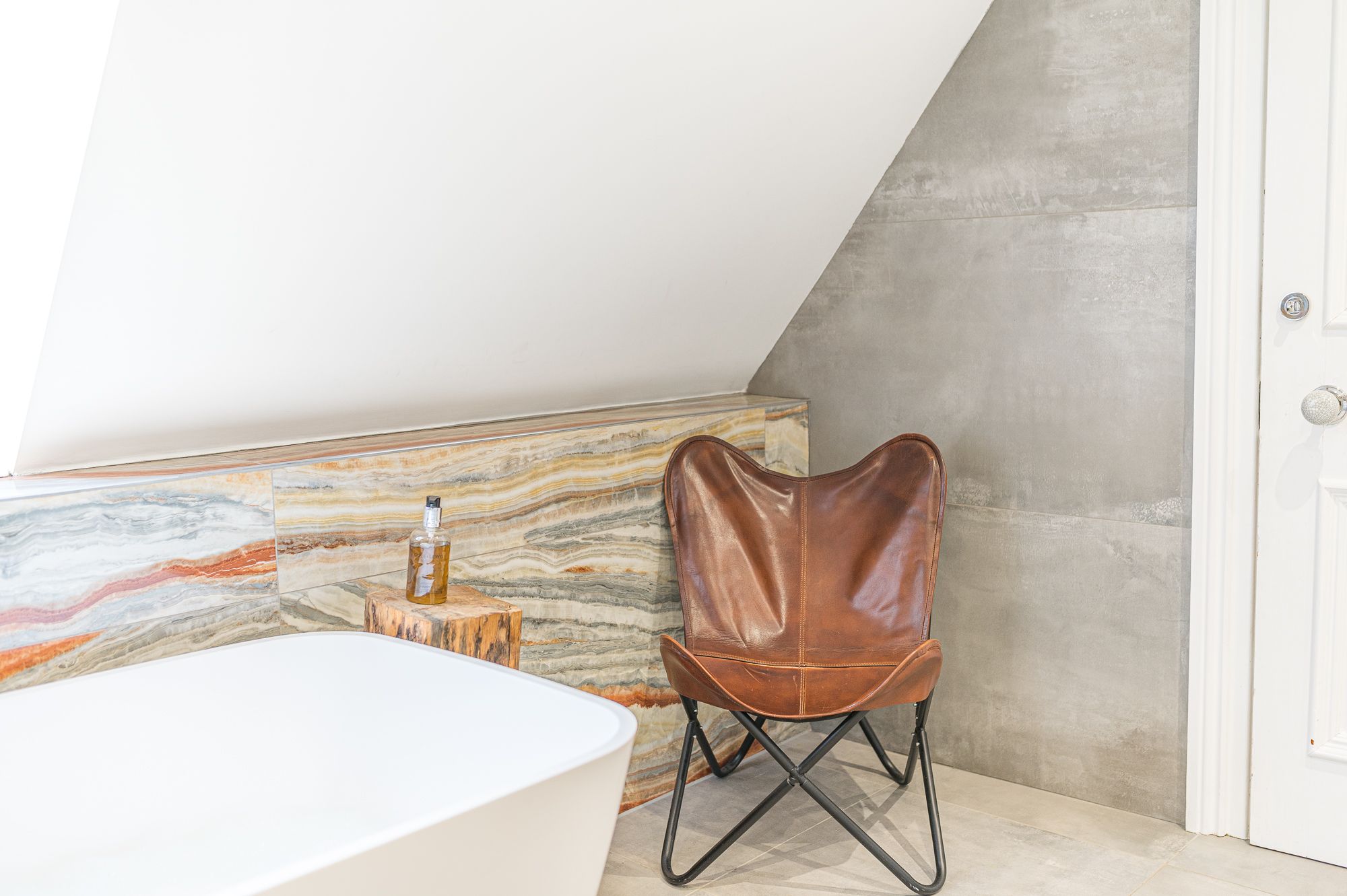 Take a seat and relax while your bath is running