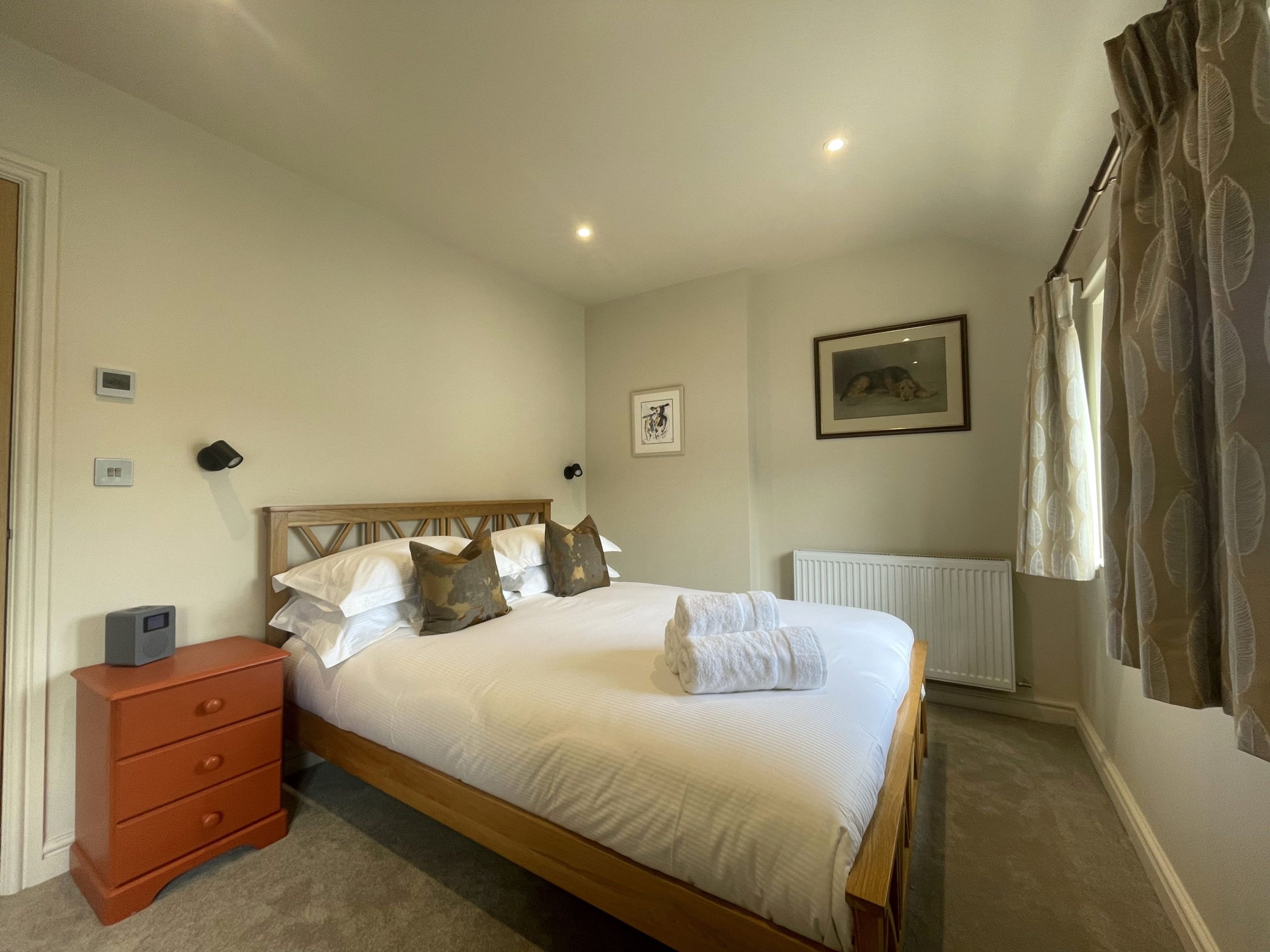 Relax in a king sized bed after a day of activities in Keswick