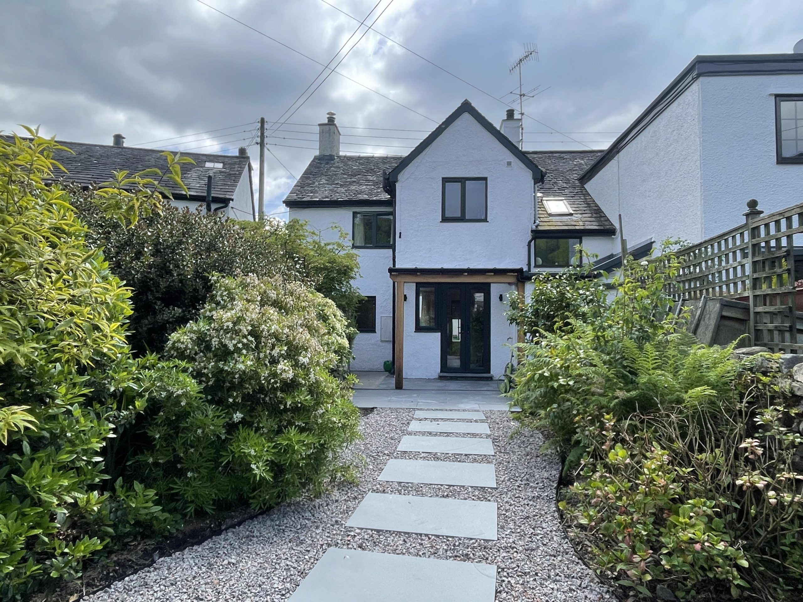 The rear view of the property taken from the beautifully maintained garden