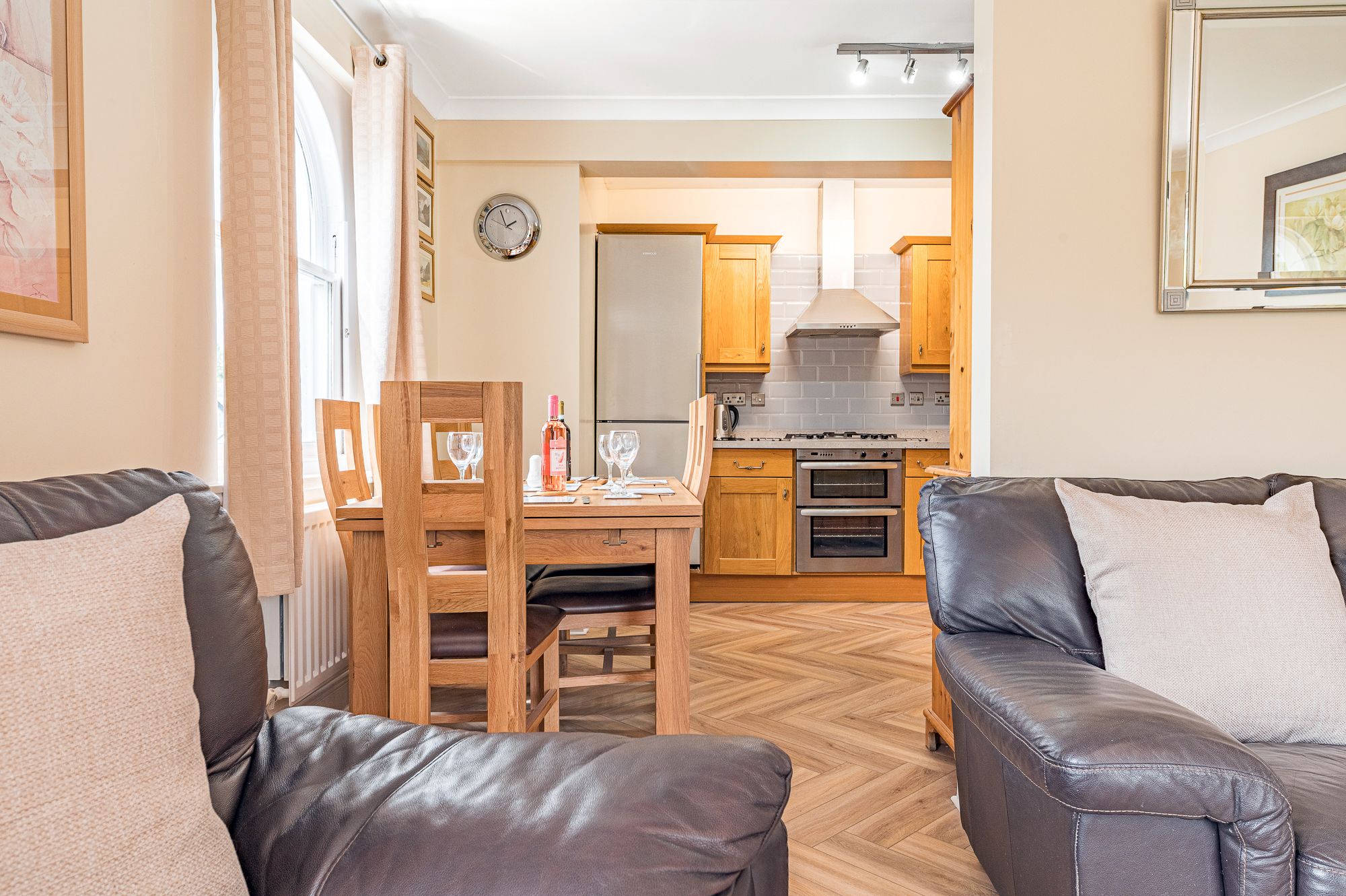 The beautiful parquet flooring throughout the open plan living area has been recently installed