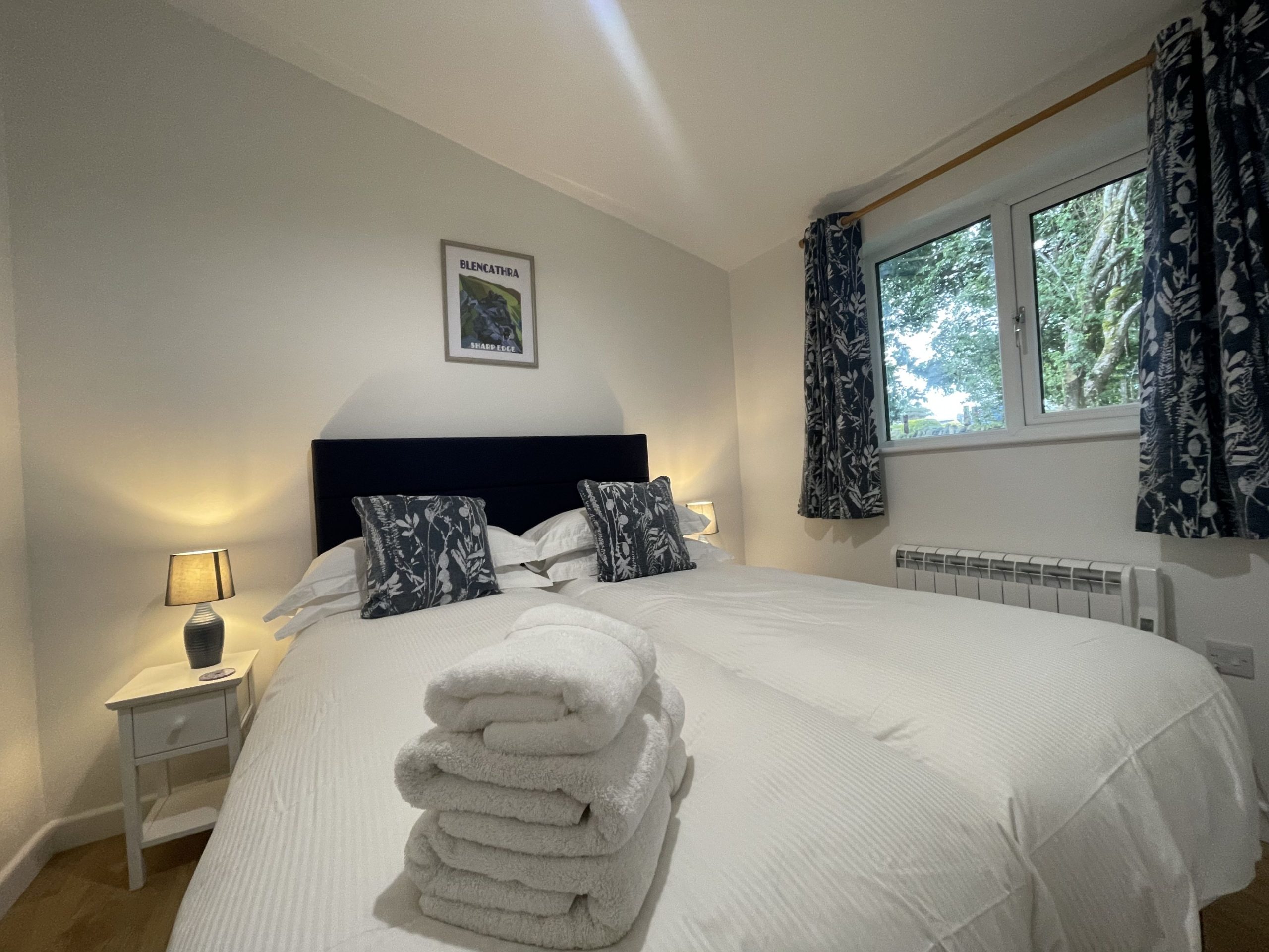 Posters of local landmarks decorate the light and airy bedrooms