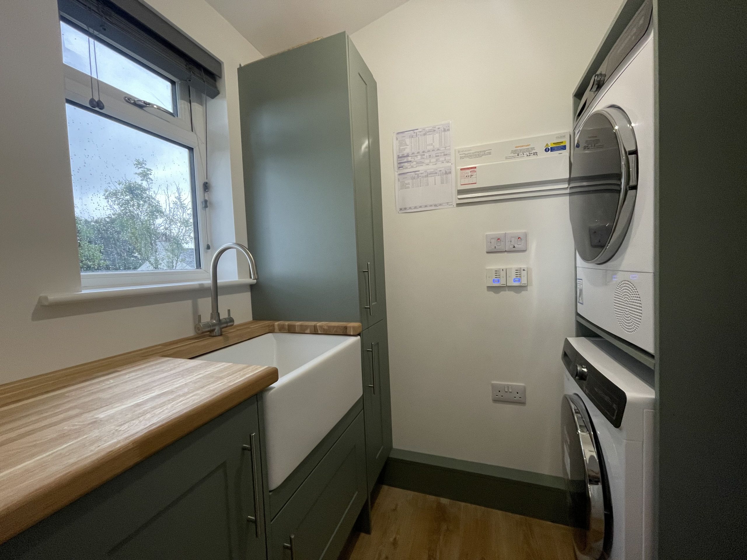 Well equipped utility area with washer/drier