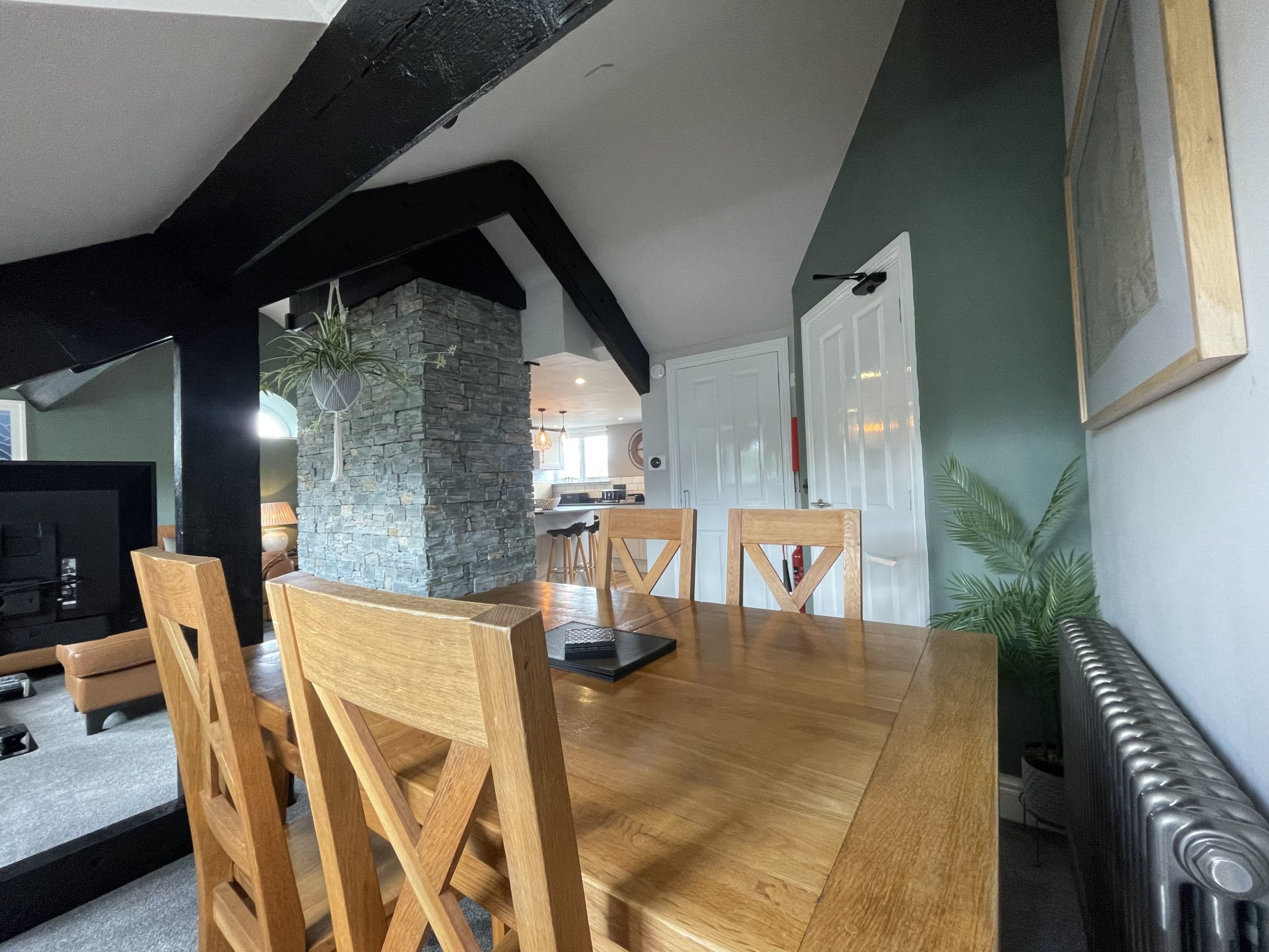 The apartment has an open plan living/dining and kitchen area 