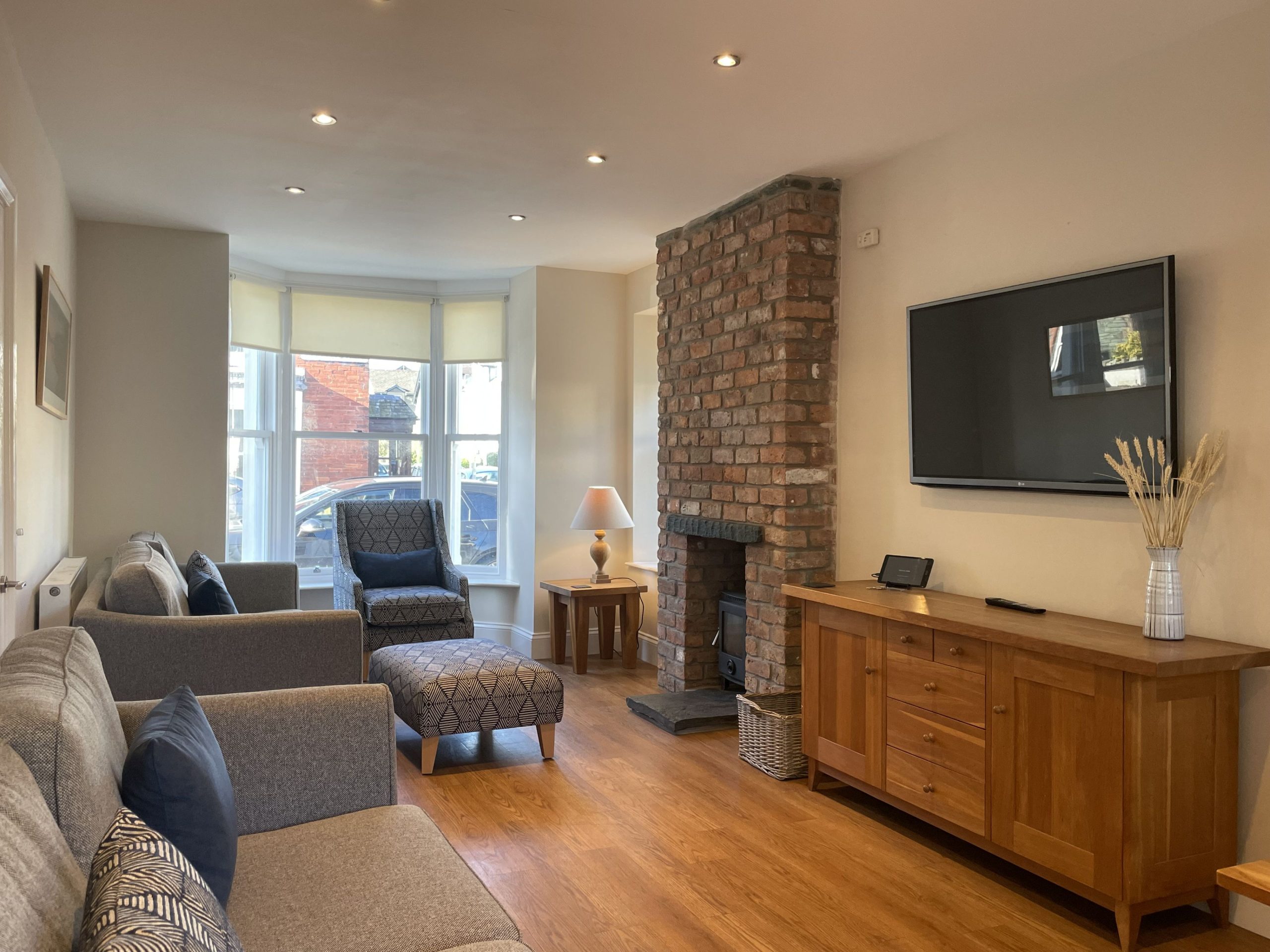 The light and airy living area is the perfect spot for a large group to congregate in the evenings