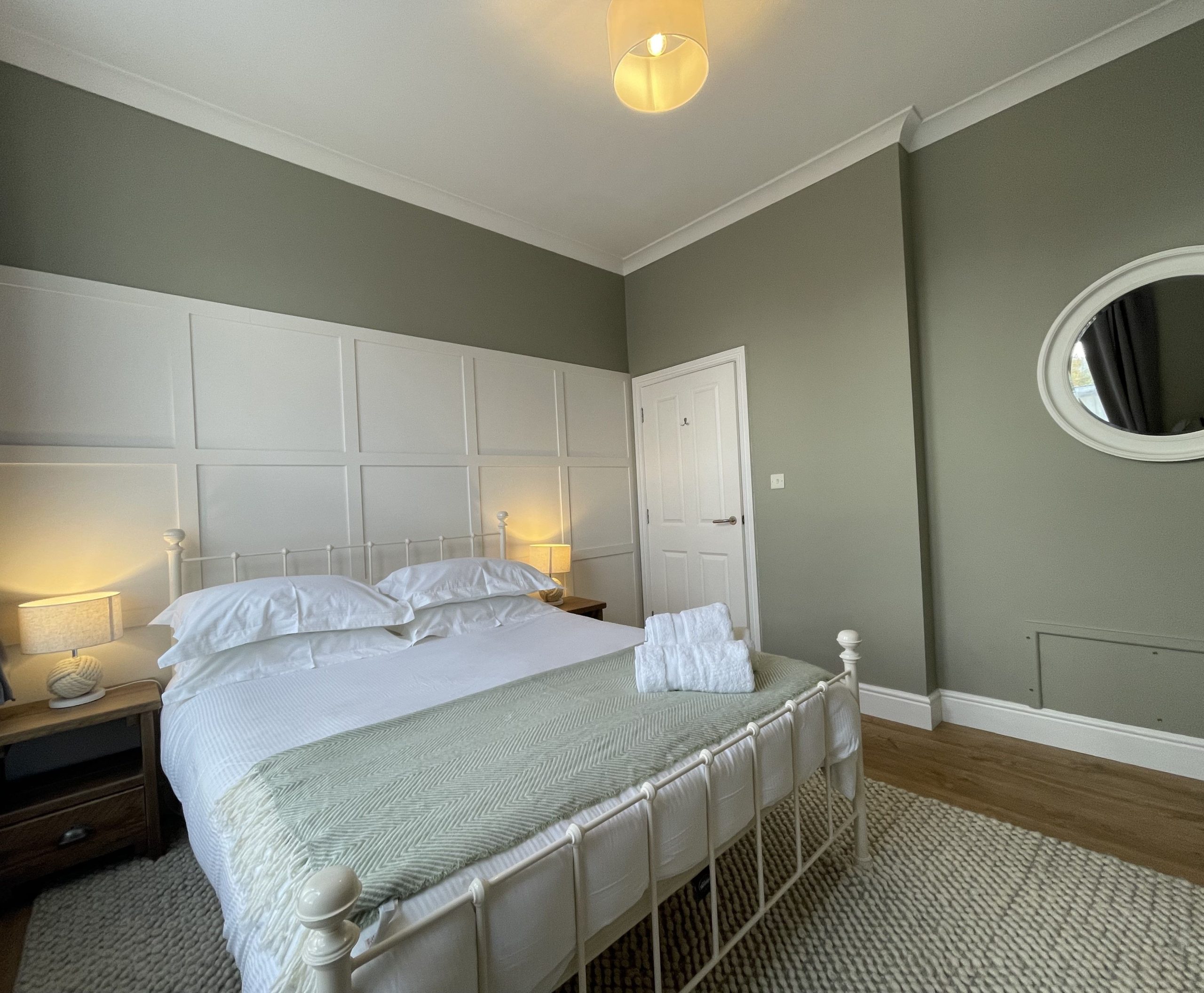 The master bedroom features a king bed